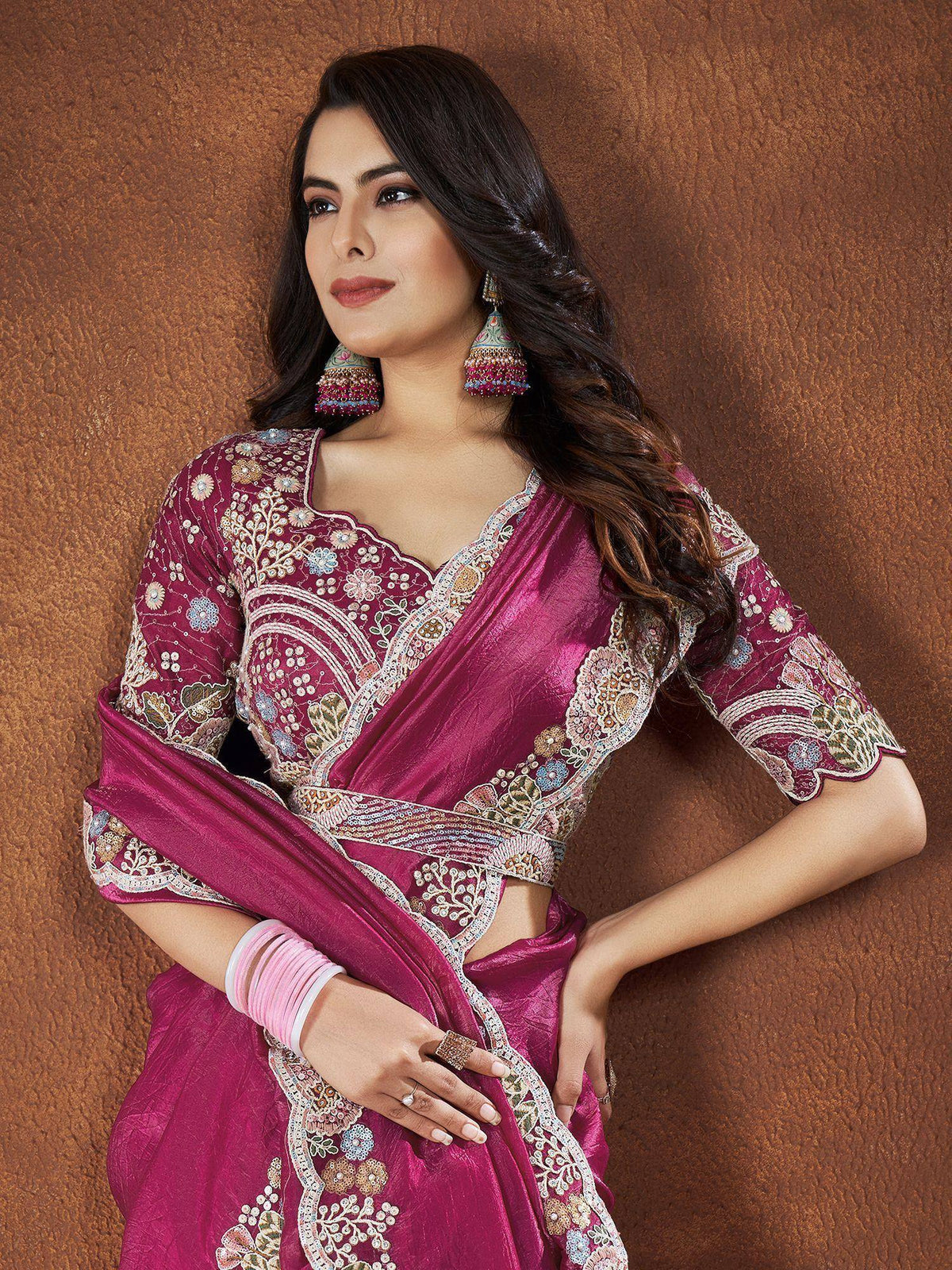 Elegant maroon embroidered saree with floral detailing, perfect for Indian ethnic wear occasions