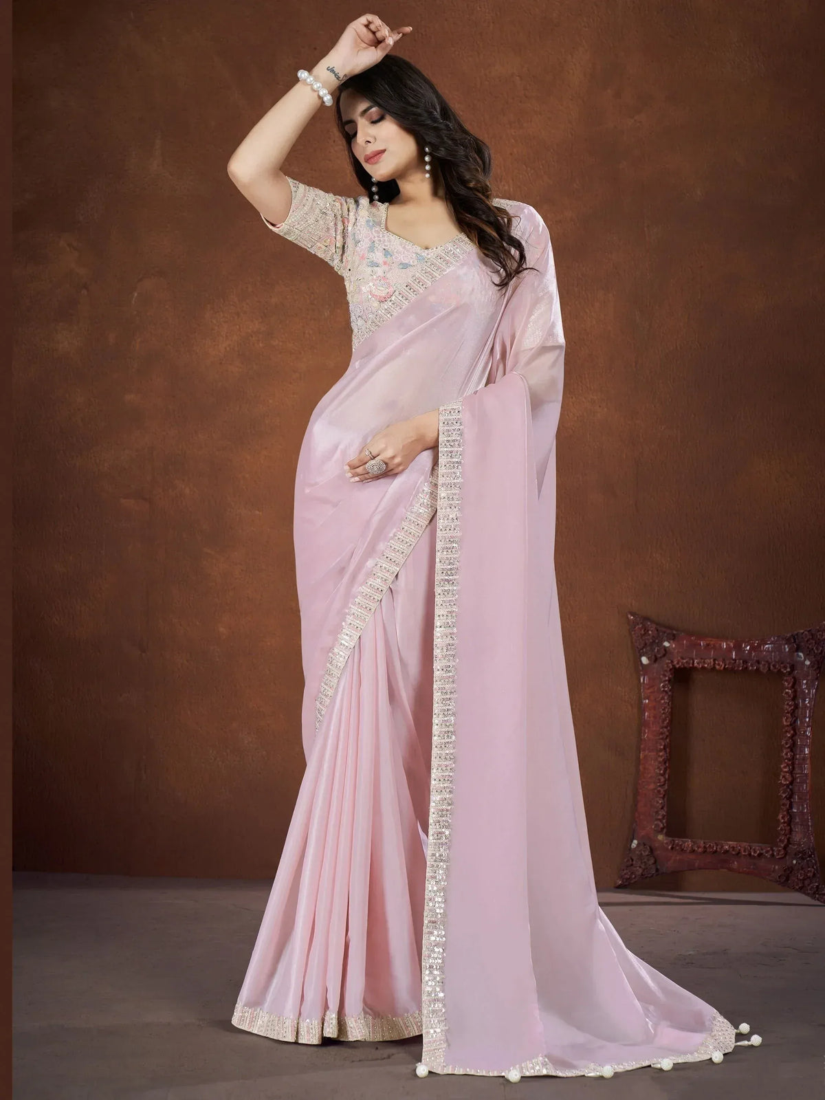 Elegant pink designer saree with sequin border and embroidered blouse, perfect for Indian ethnic occasions