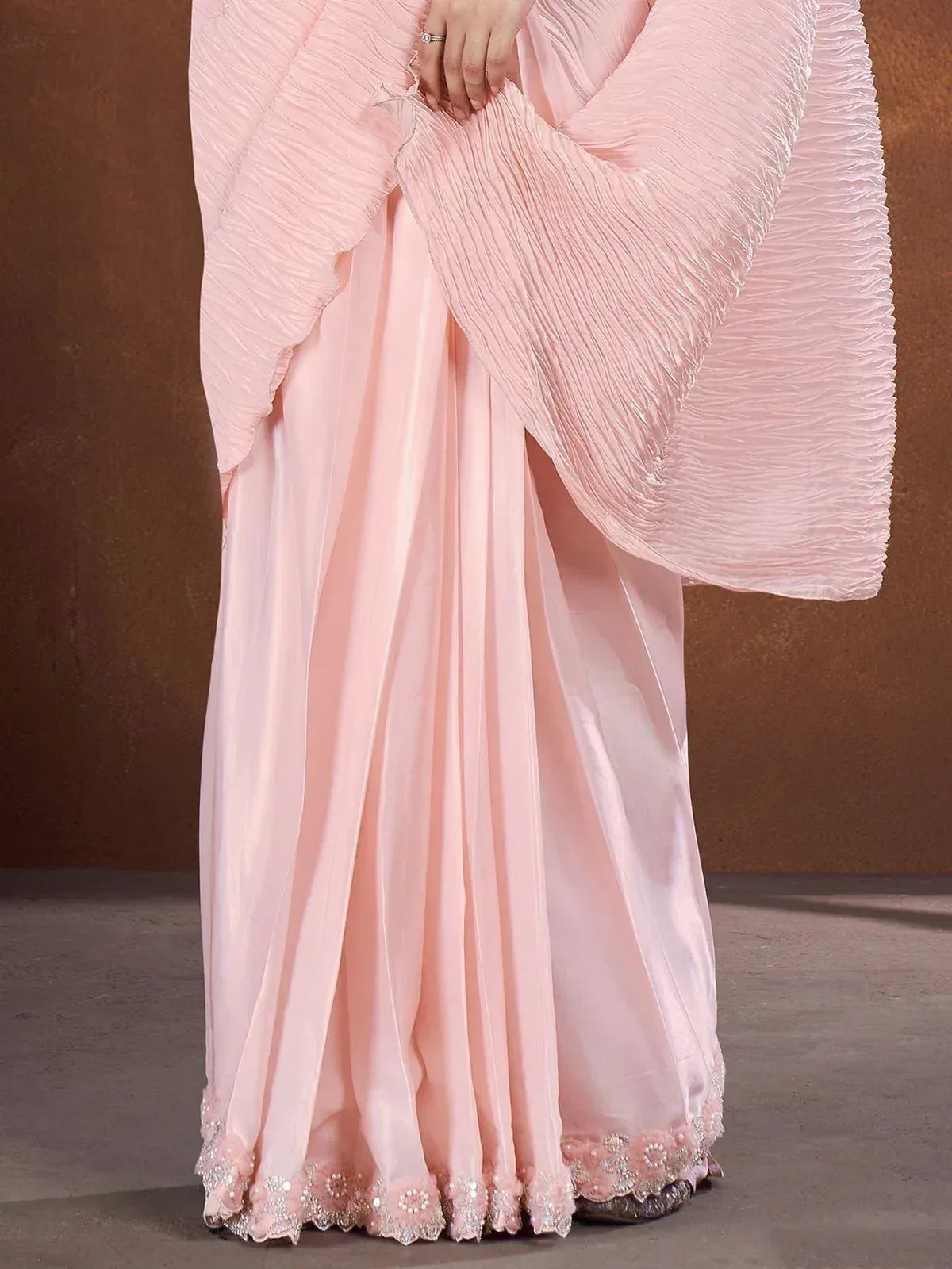Pink pleated saree with floral embroidery hem and matching blouse, elegant Indian ethnic wear