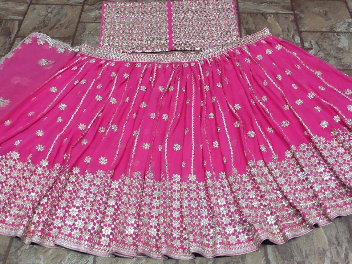 Pink designer lehenga choli with gold floral embroidery and embellished border, ethnic wear for women