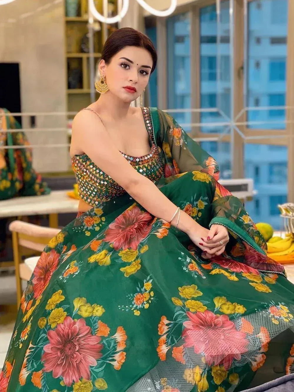 Green floral lehenga choli with mirror work, perfect for Indian ethnic wear and festive occasions.