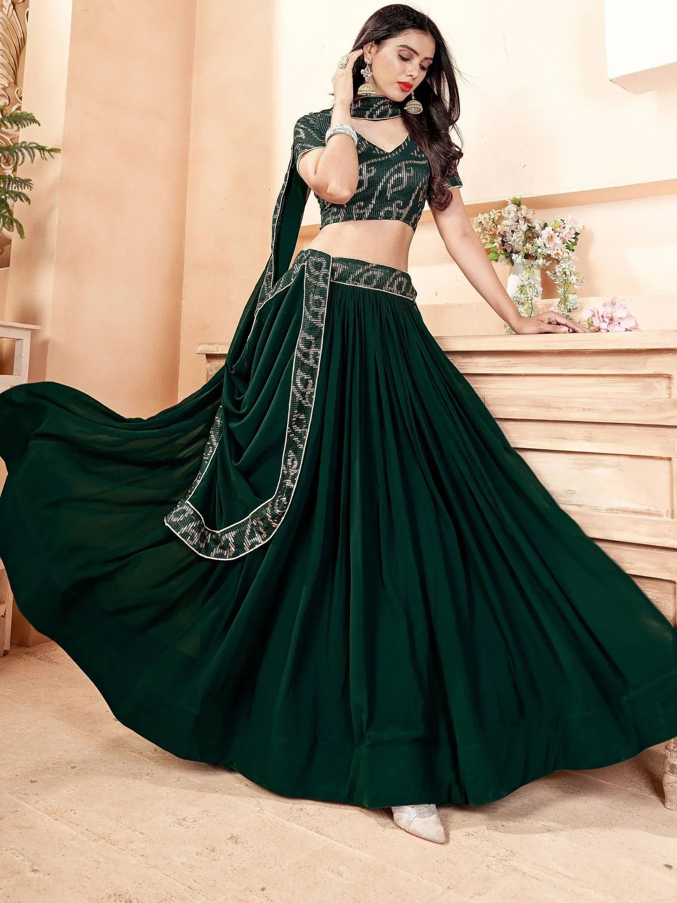 Emerald green designer lehenga choli with sequin work, perfect for Indian ethnic wear occasions