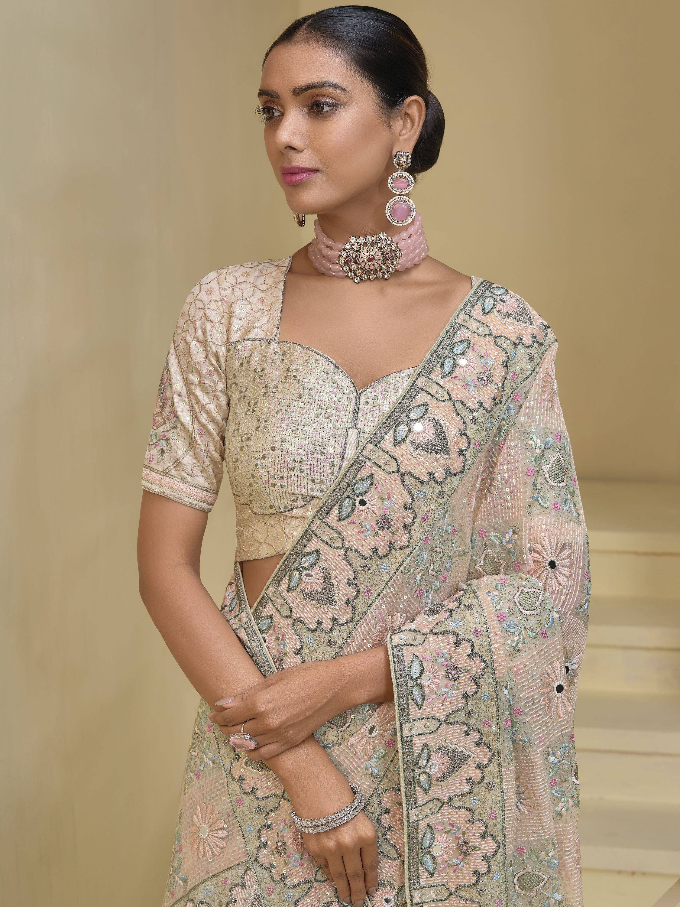 Elegant Indian saree with floral embroidery, sequins, and matching choker for festive occasions