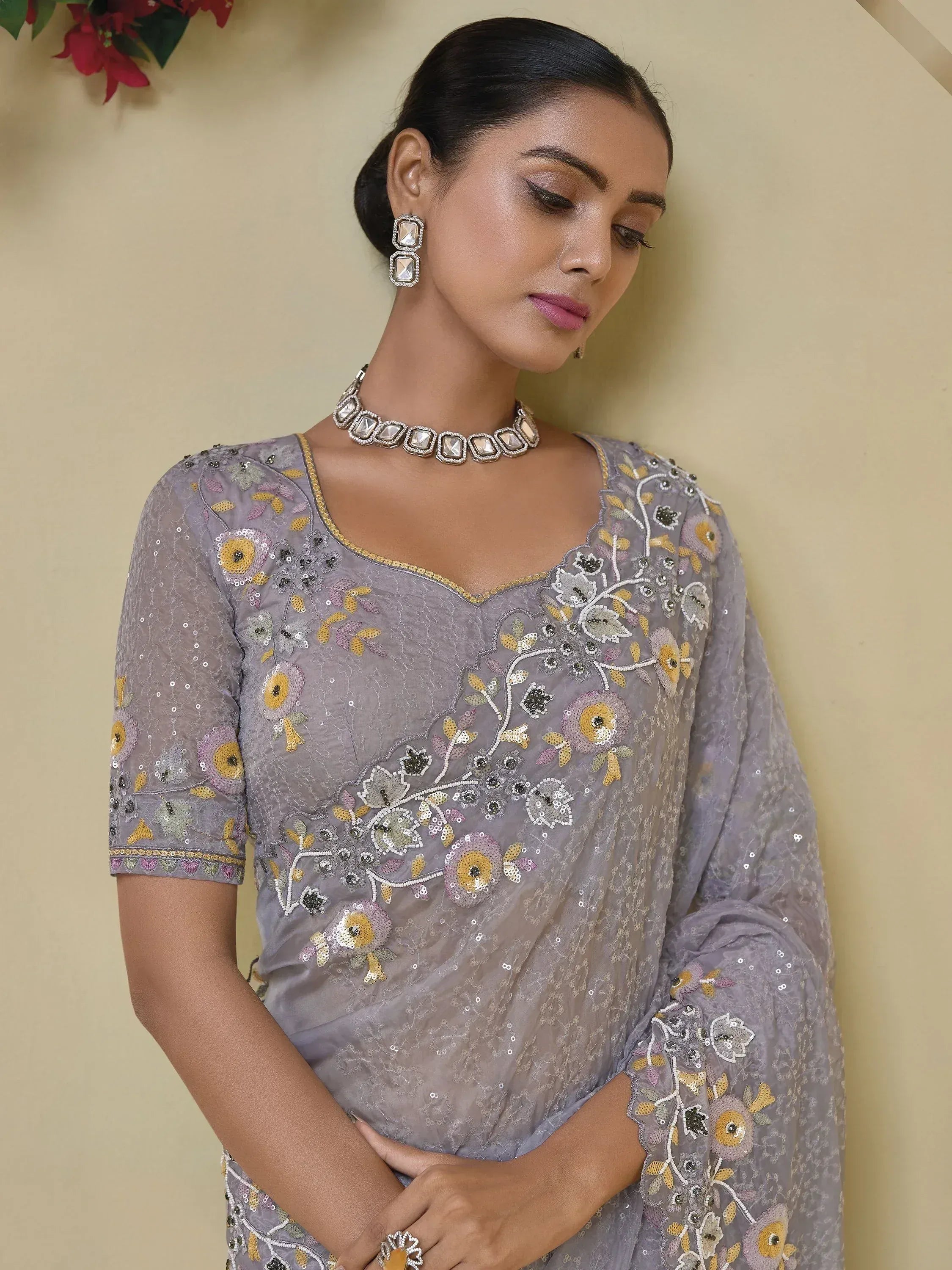 Grey floral embroidered ethnic gown with sequins, perfect for Indian occasions and parties.