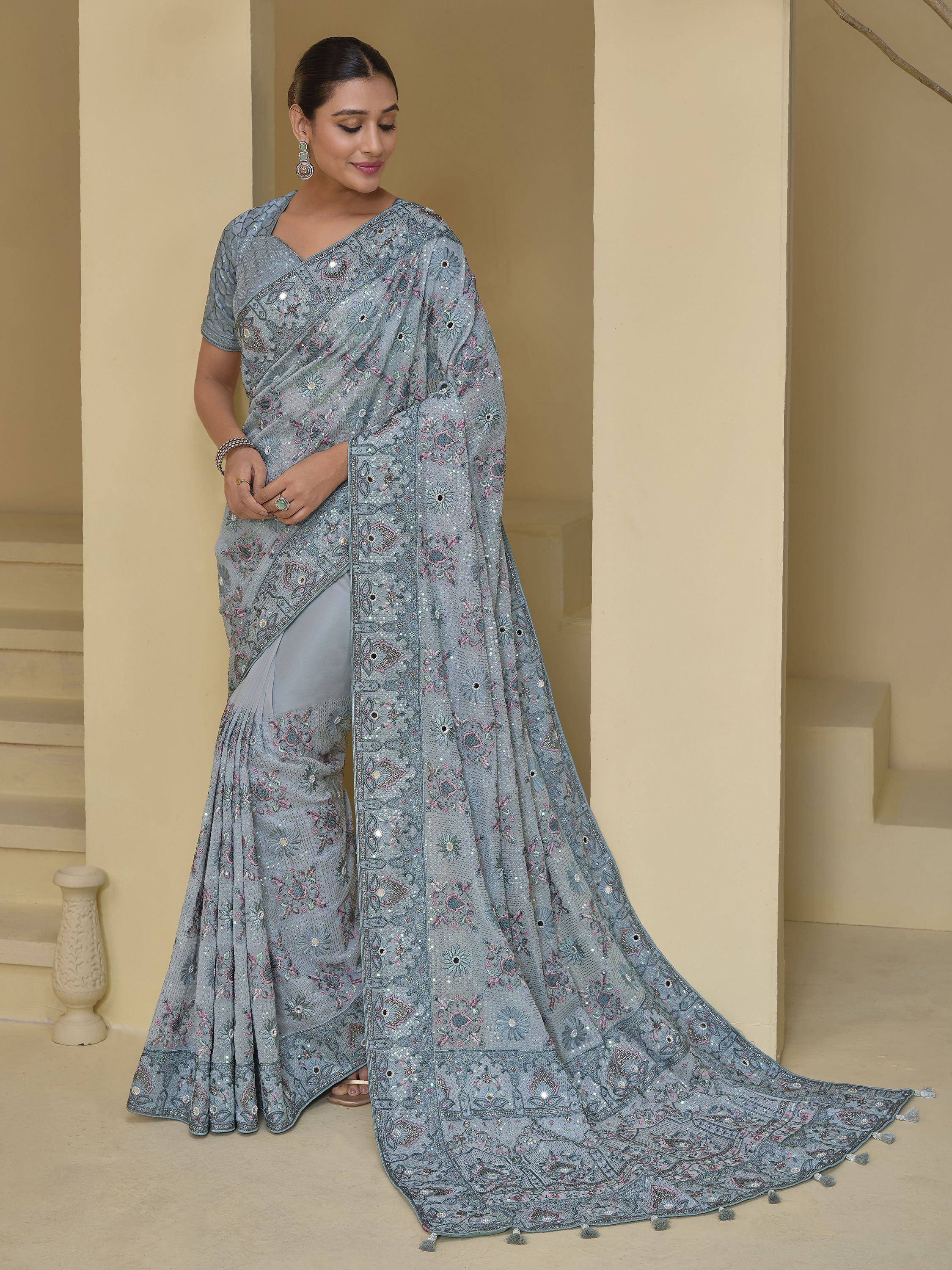 Elegant grey floral embroidered saree with sequins and tassels, perfect for Indian ethnic occasions