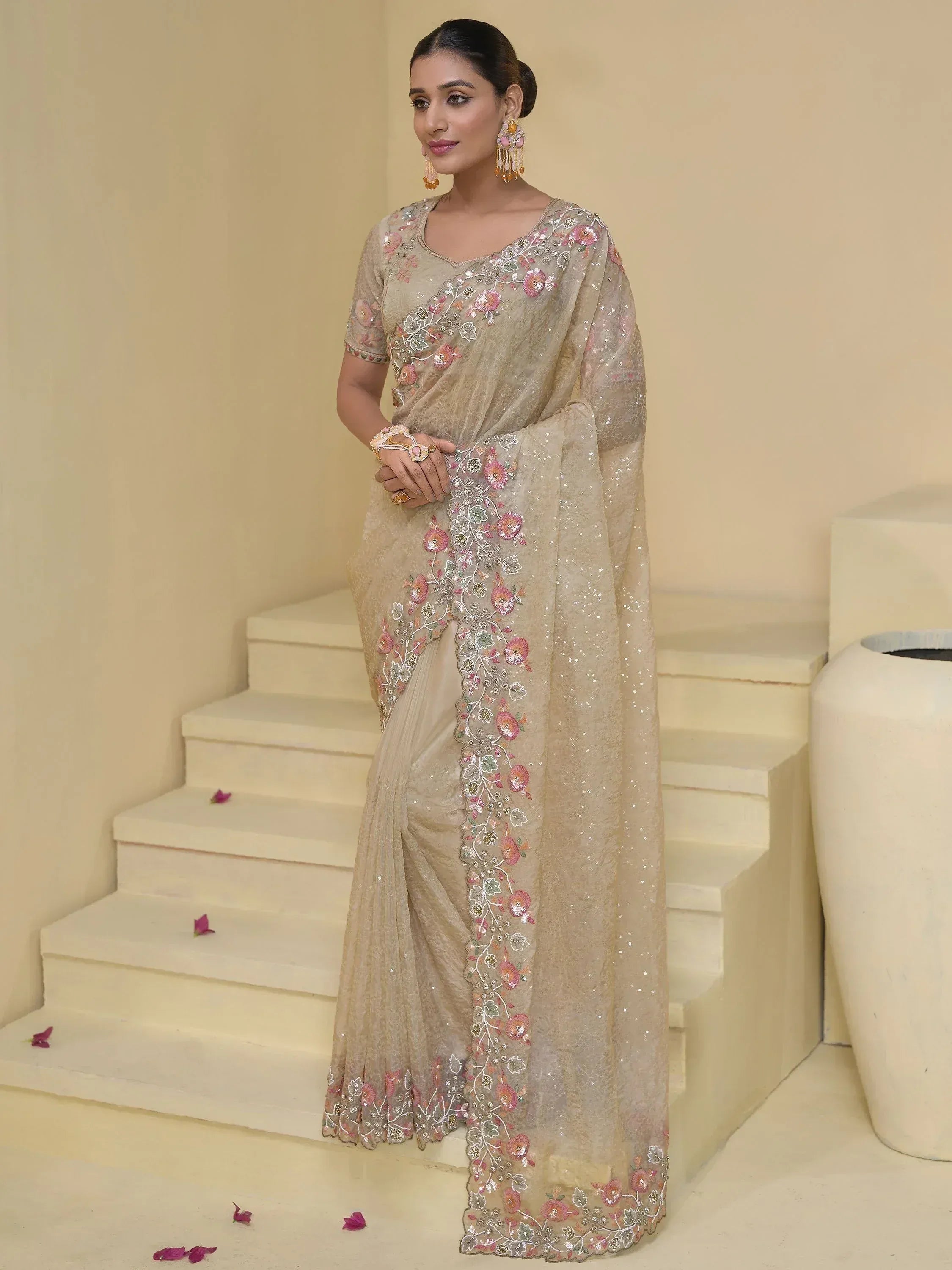 Beige floral embroidered saree with sequins, perfect for Indian ethnic wear occasions
