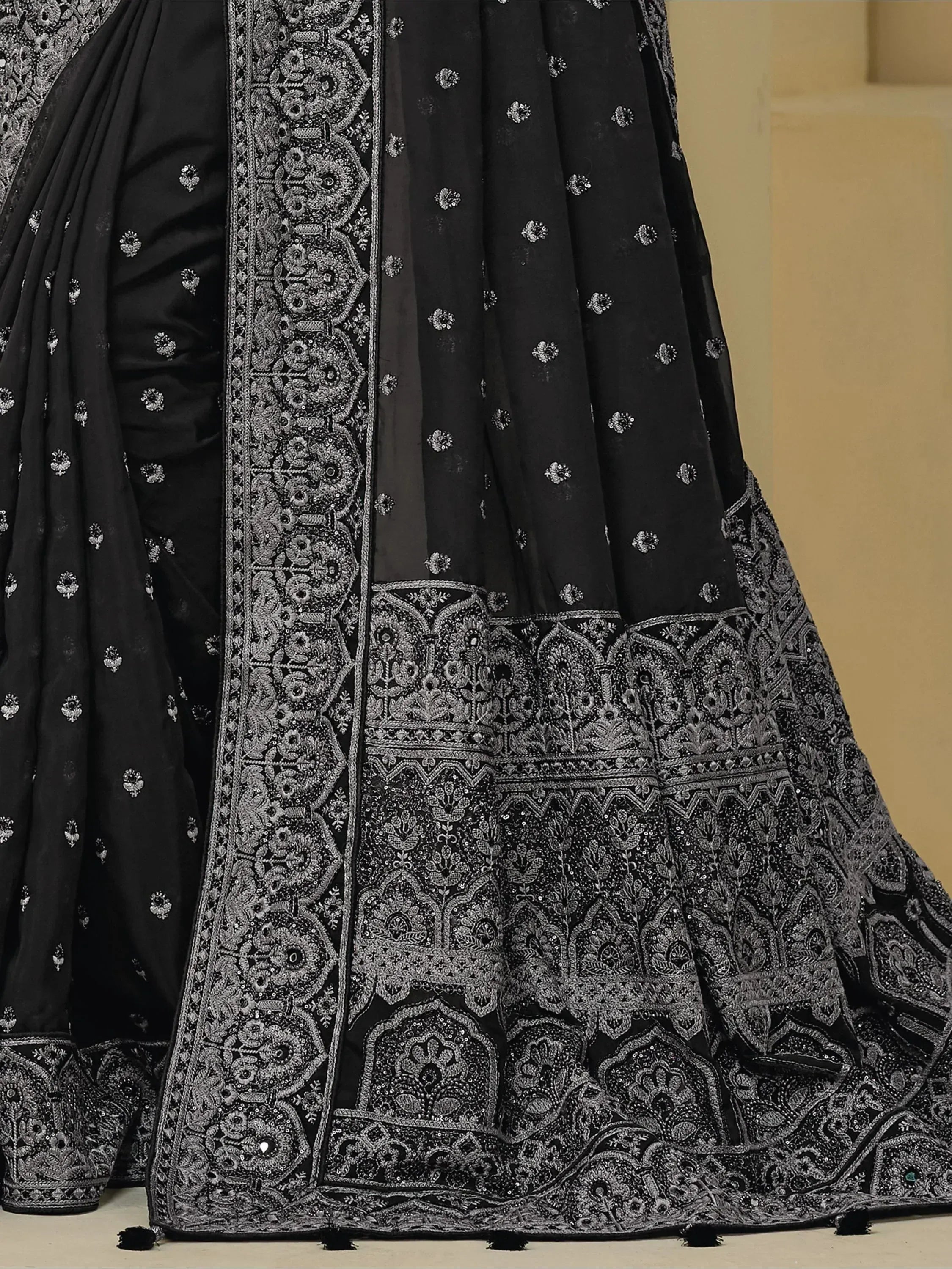 Black designer lehenga choli with intricate silver embroidery and sequin work, perfect for Indian ethnic wear.