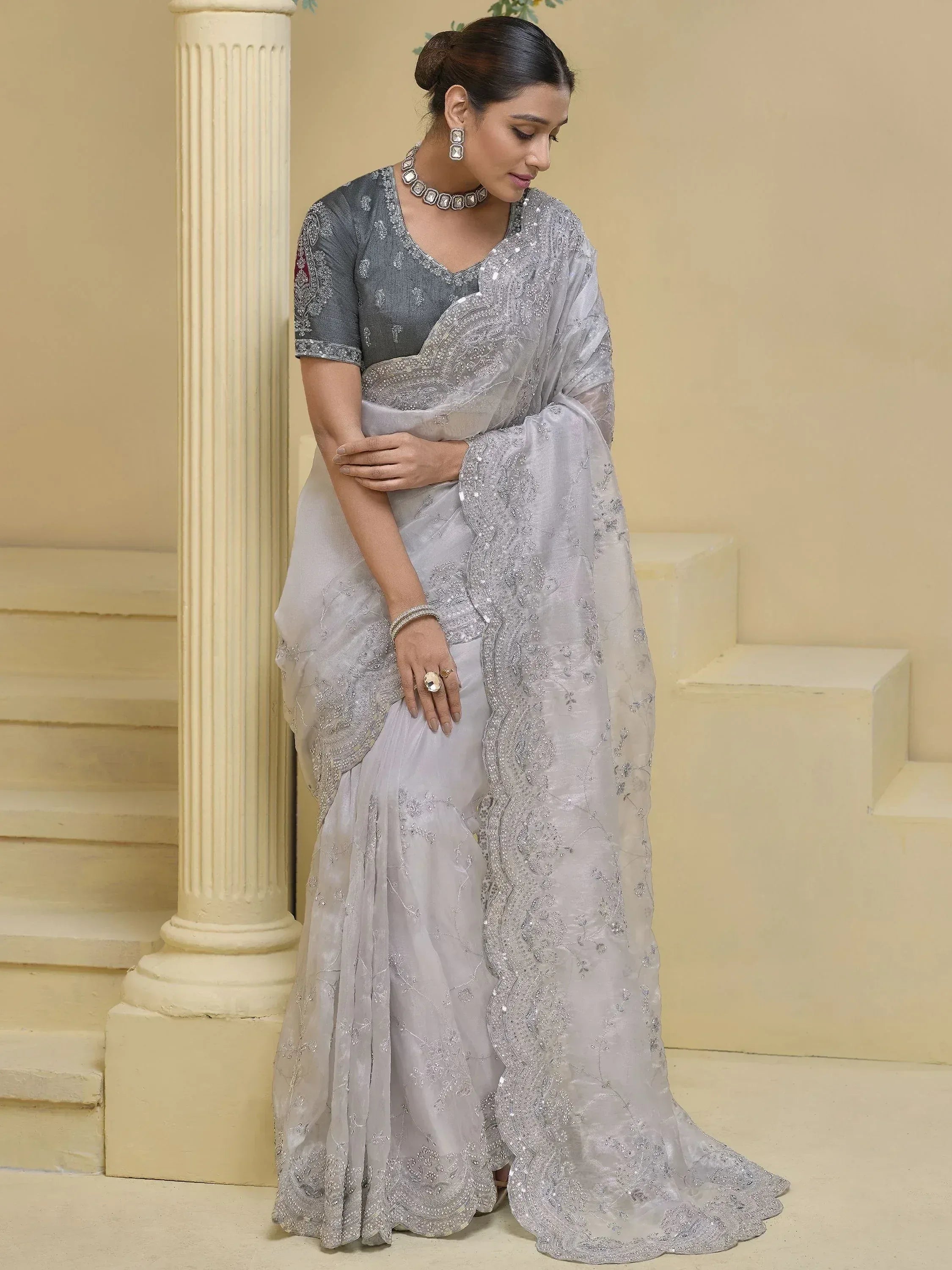 Elegant grey embroidered saree with matching blouse, perfect for Indian ethnic occasions