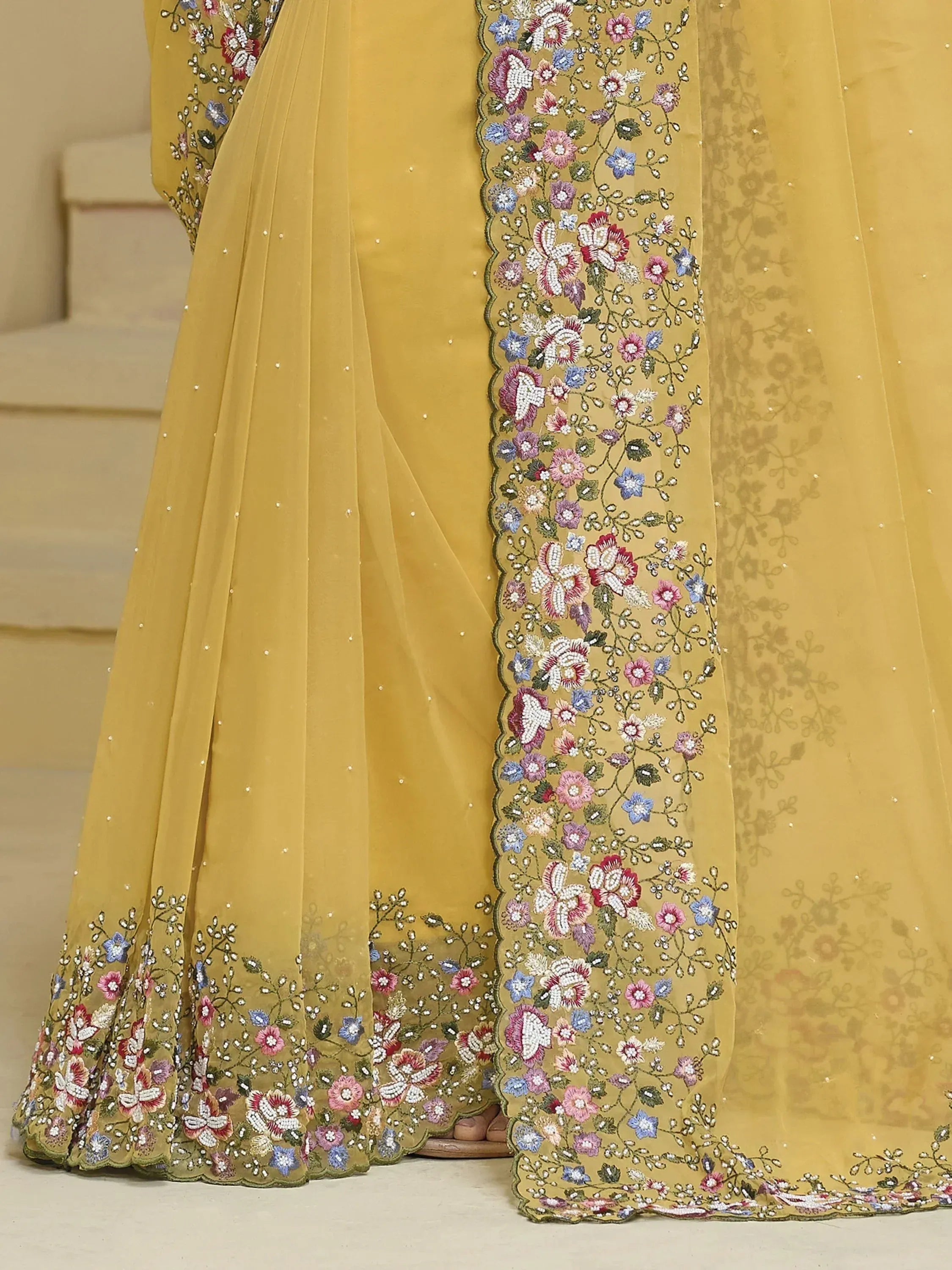 Mustard yellow lehenga with floral embroidery and sheer dupatta, Indian ethnic wear