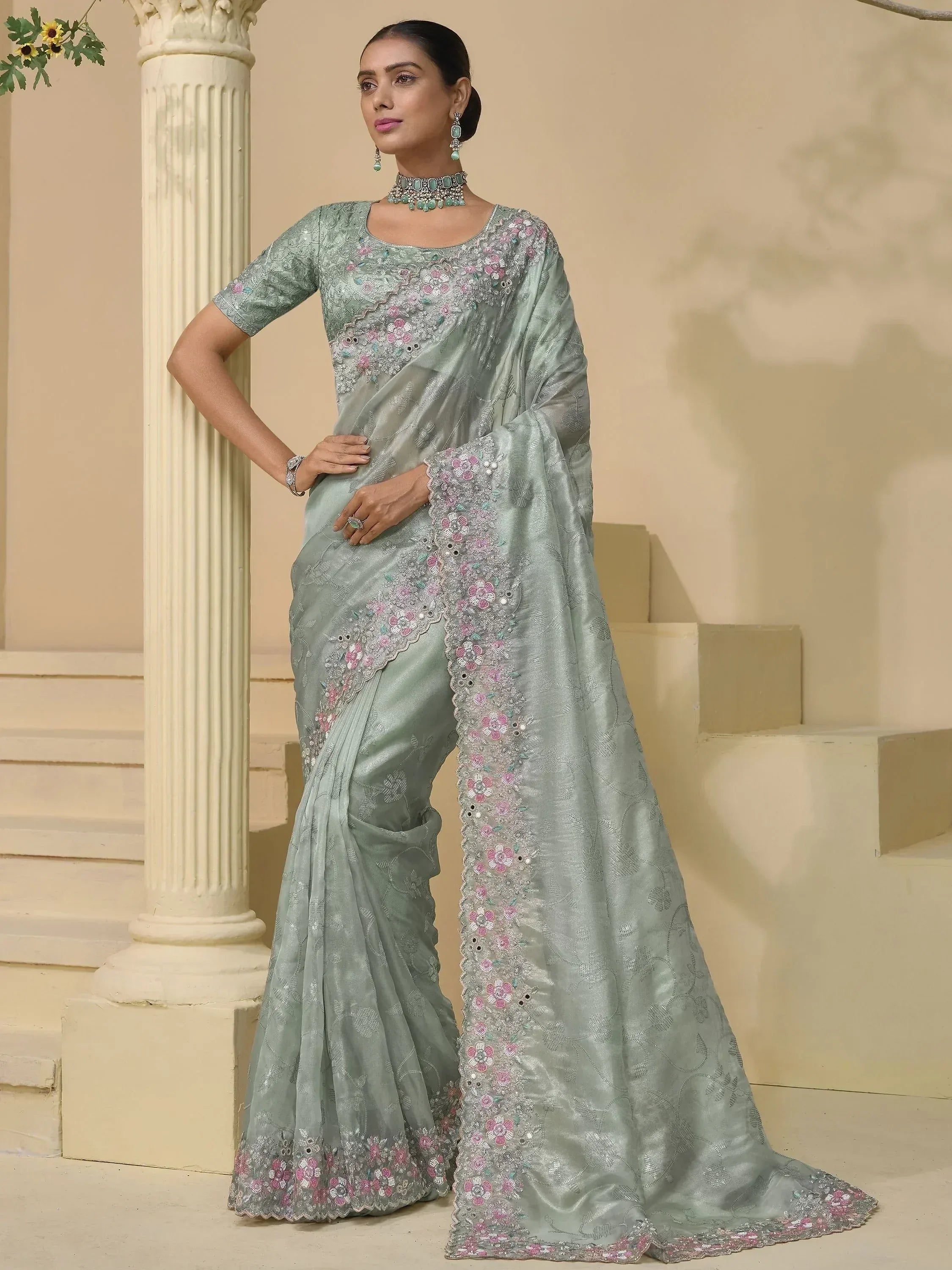 Mint green embroidered saree with floral work, perfect for Indian ethnic wear occasions