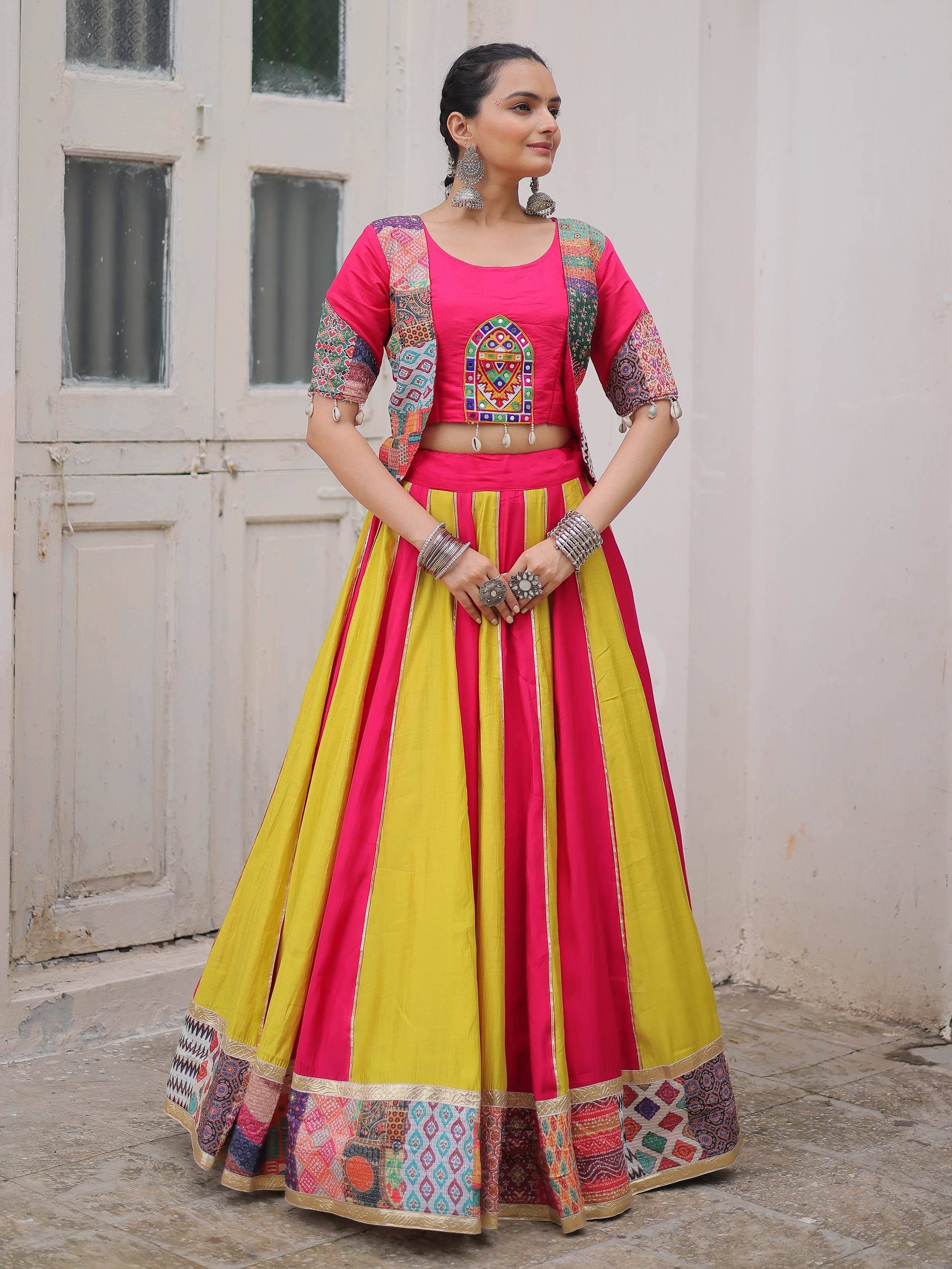 Vibrant pink and yellow lehenga choli with embroidered blouse and patchwork dupatta, perfect for Indian ethnic occasions.