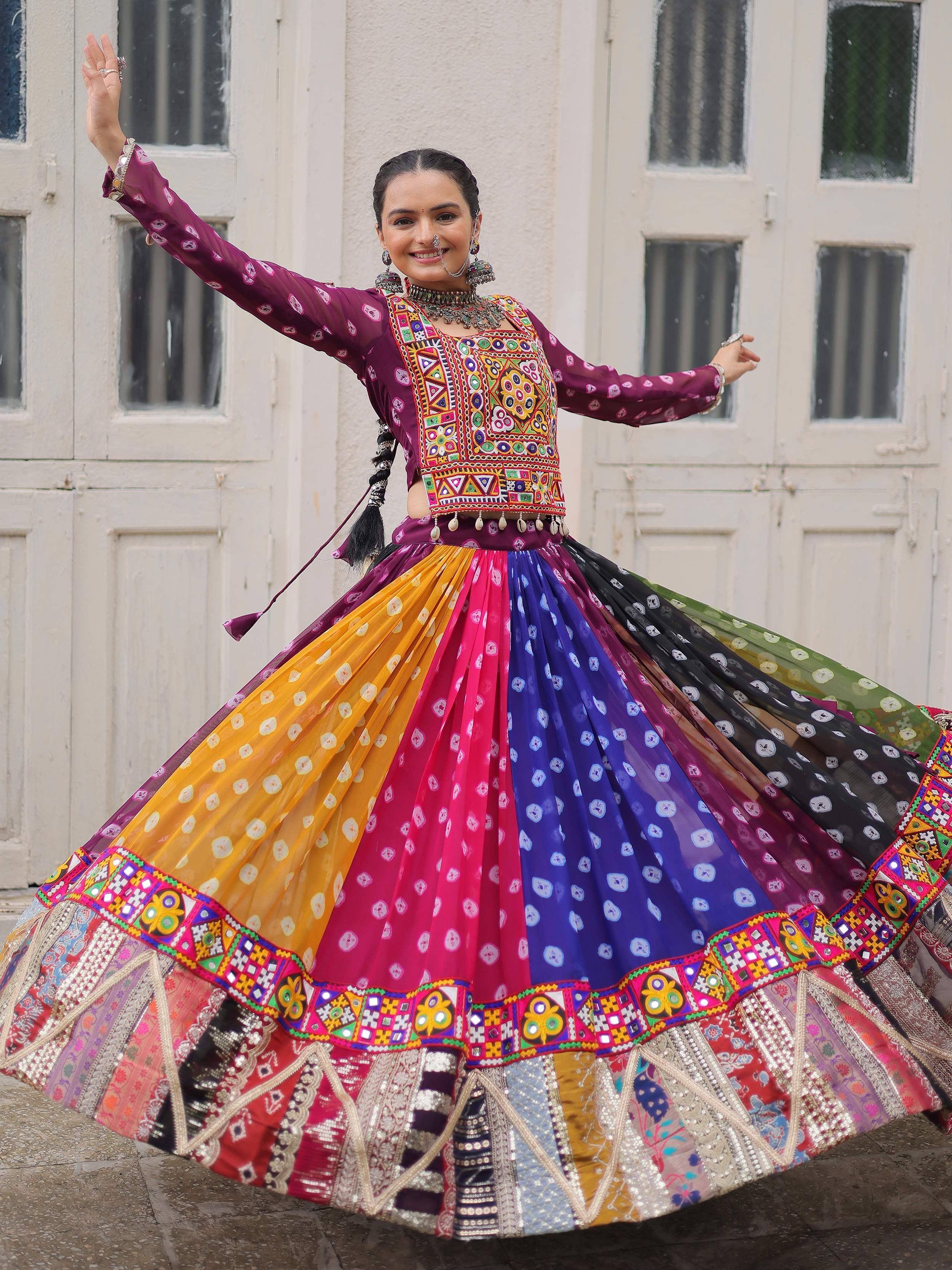 Vibrant Indian ethnic lehenga choli with colorful embroidery and mirror work, perfect for festive occasions.