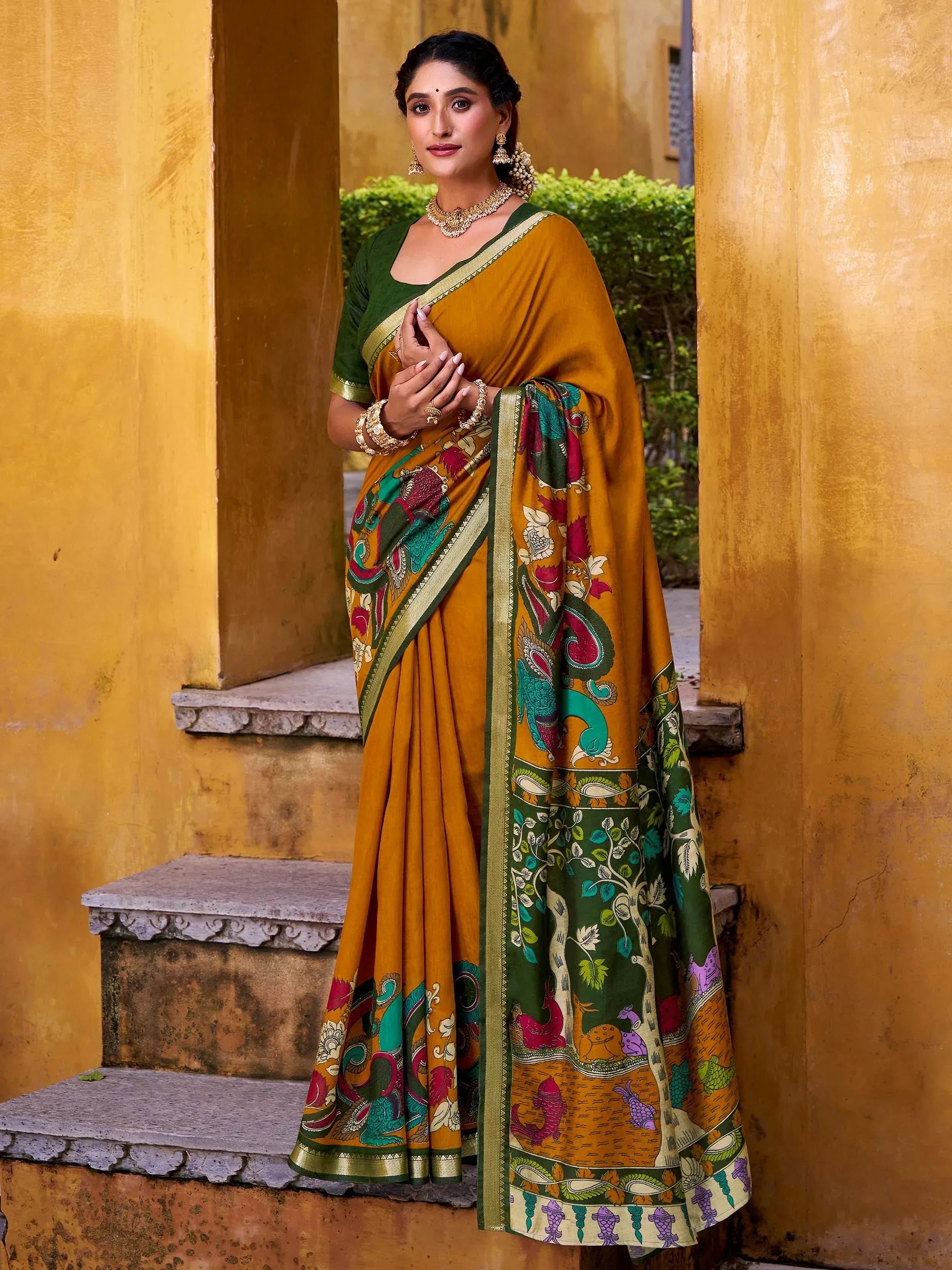 Mustard and green printed saree with peacock design, ethnic wear for women