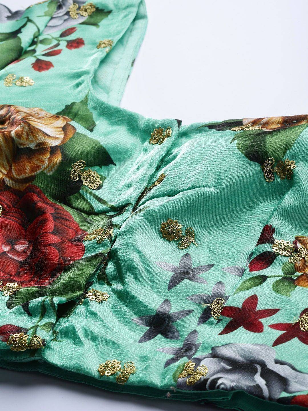 Mint green floral lehenga choli with gold sequin embroidery and vibrant rose print