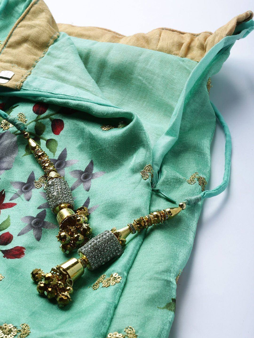 Mint green floral ethnic top with gold tassels and embroidery, perfect for Indian wear