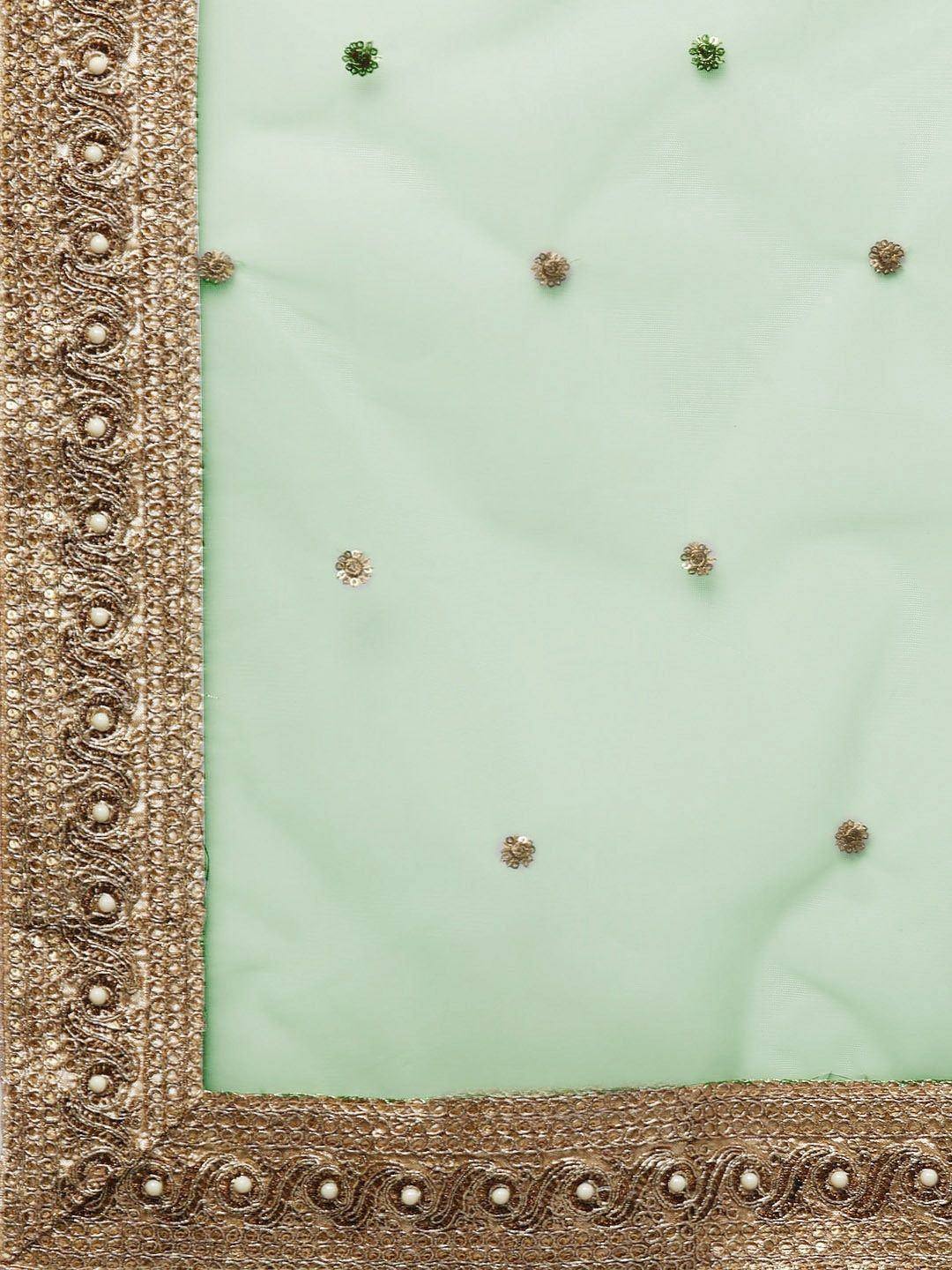 Mint green ethnic saree with gold zari border and floral sequin embellishments