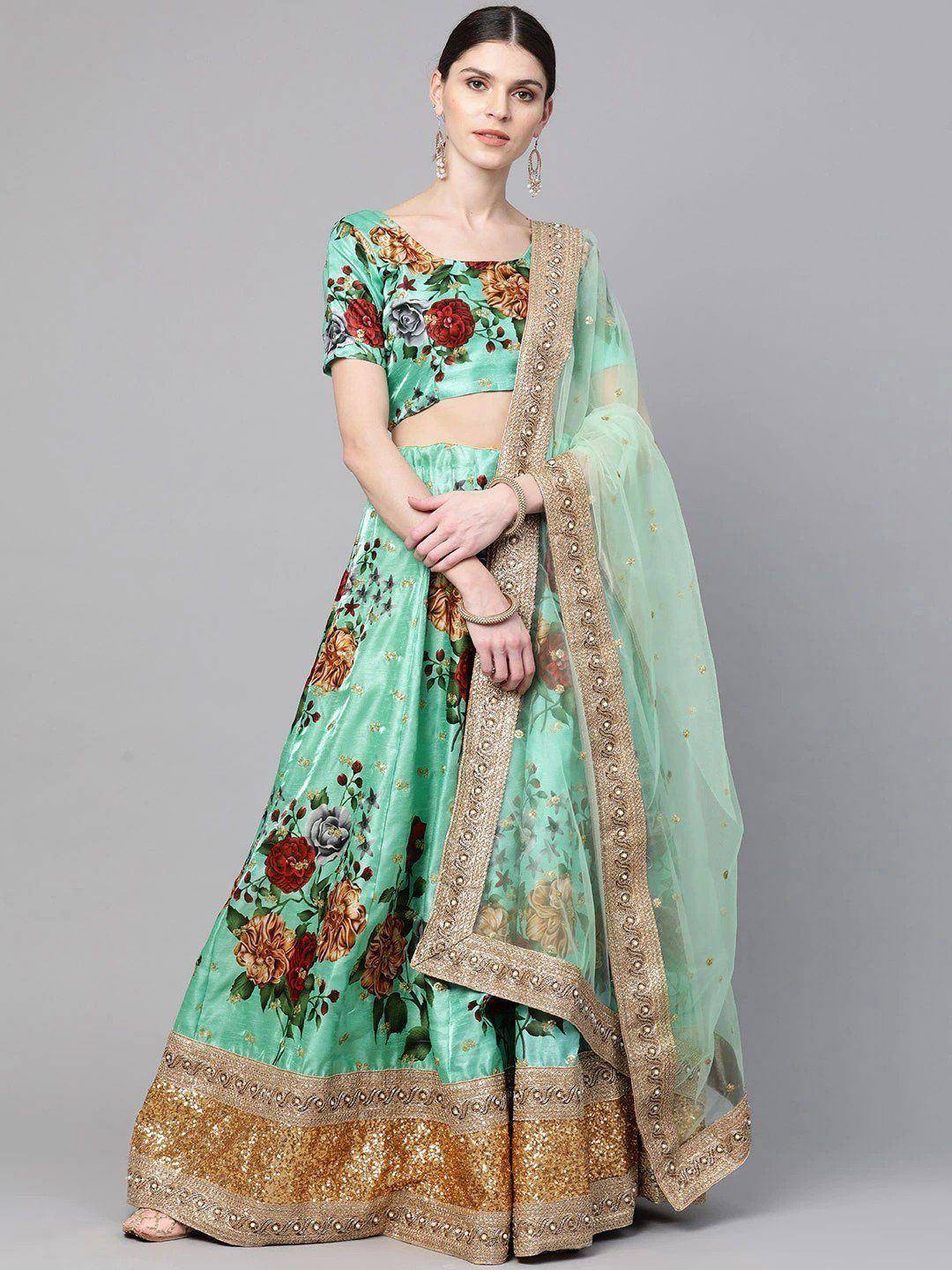 Mint green floral lehenga choli with gold embroidery and sheer dupatta, perfect for Indian ethnic occasions