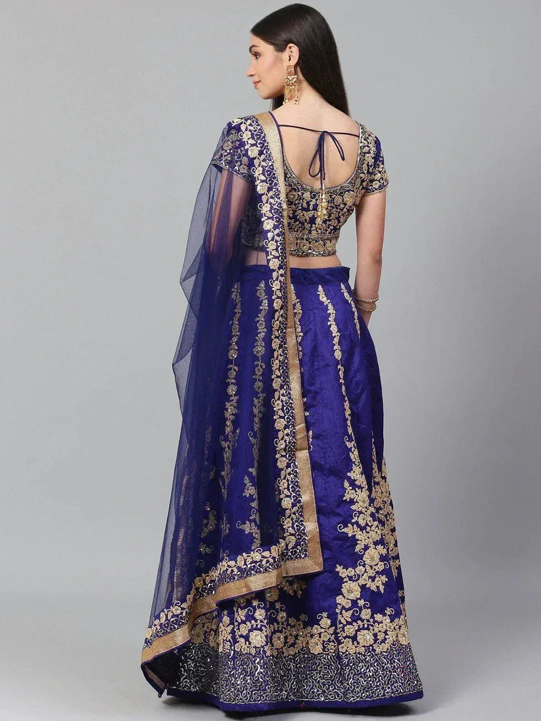 Royal blue lehenga choli with gold embroidery, back view, ethnic Indian wear