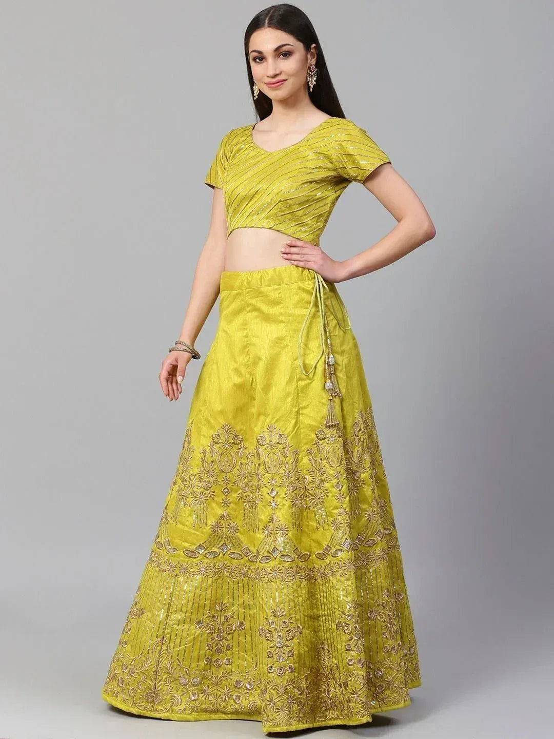 Yellow designer lehenga choli with gold embroidery, perfect for Indian ethnic wear occasions