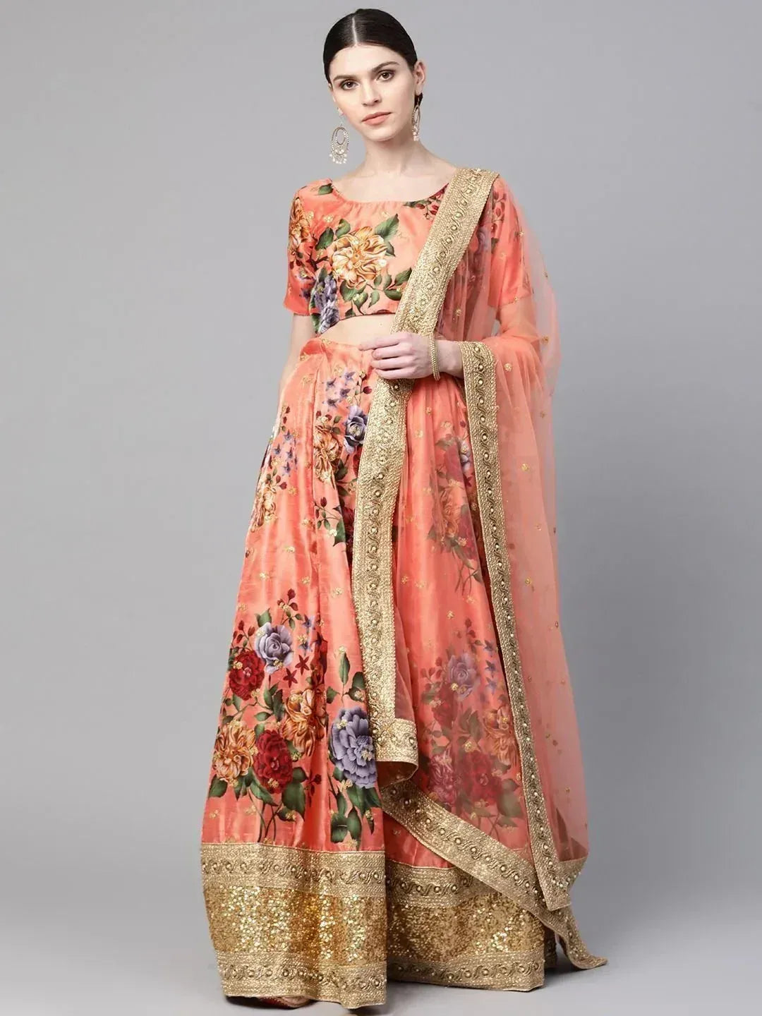 Peach floral lehenga choli with gold embroidery, perfect for Indian ethnic wear occasions