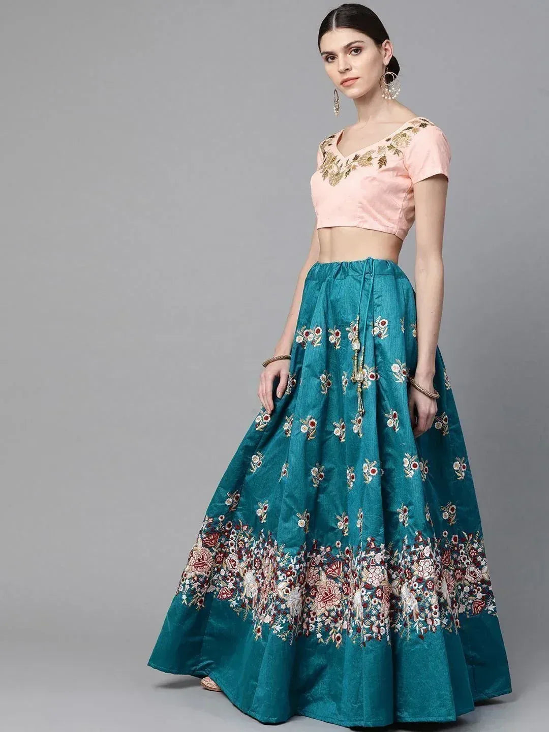 Teal embroidered lehenga with pink blouse, floral motifs, Indian ethnic wear
