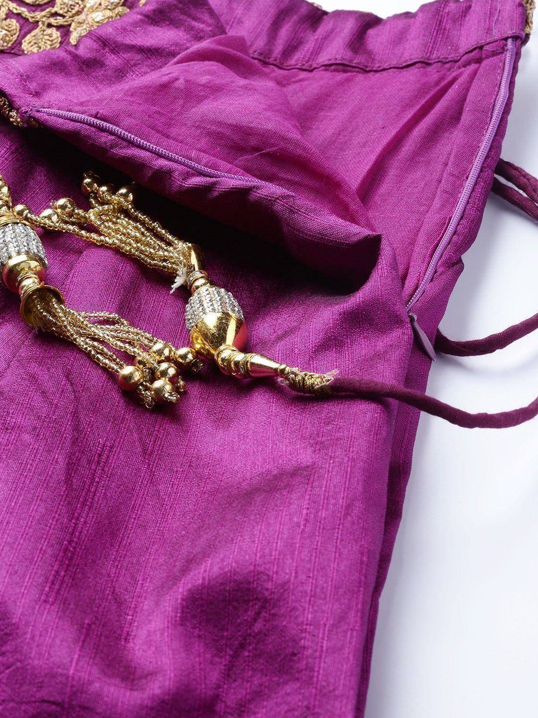 Purple ethnic blouse with gold embroidery and tassel detailing, perfect for Indian wear