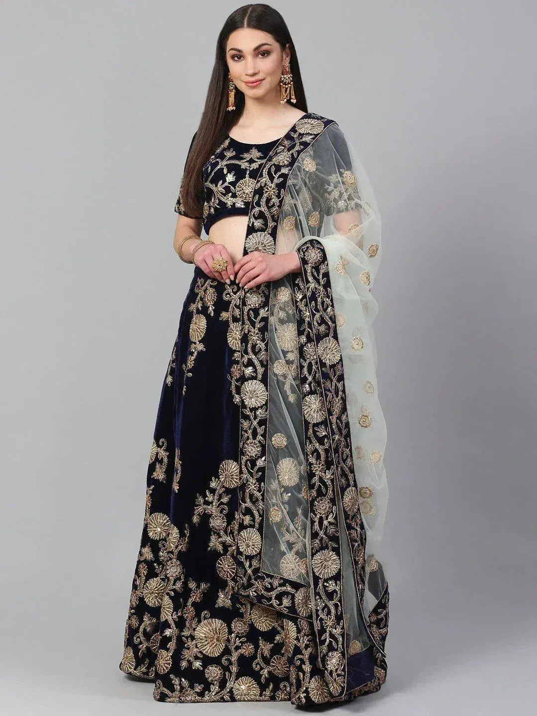 Navy blue velvet lehenga choli with gold floral embroidery and sheer dupatta, Indian ethnic wear