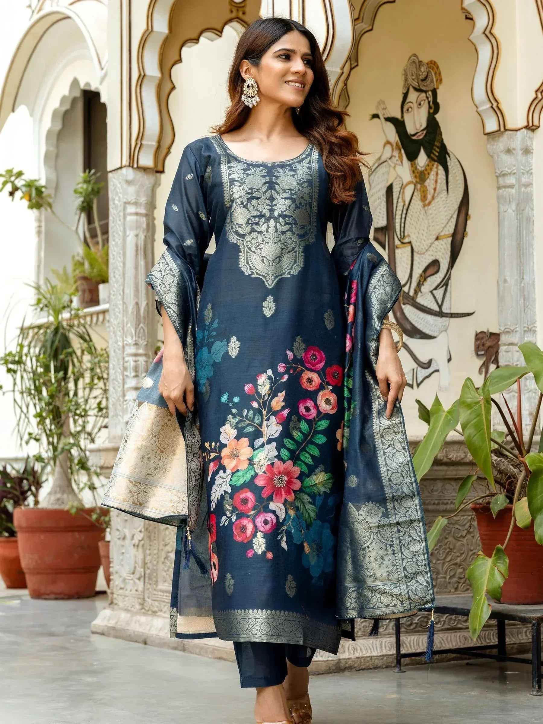 Navy blue floral printed salwar kameez with silver embroidery, perfect for Indian ethnic wear occasions.