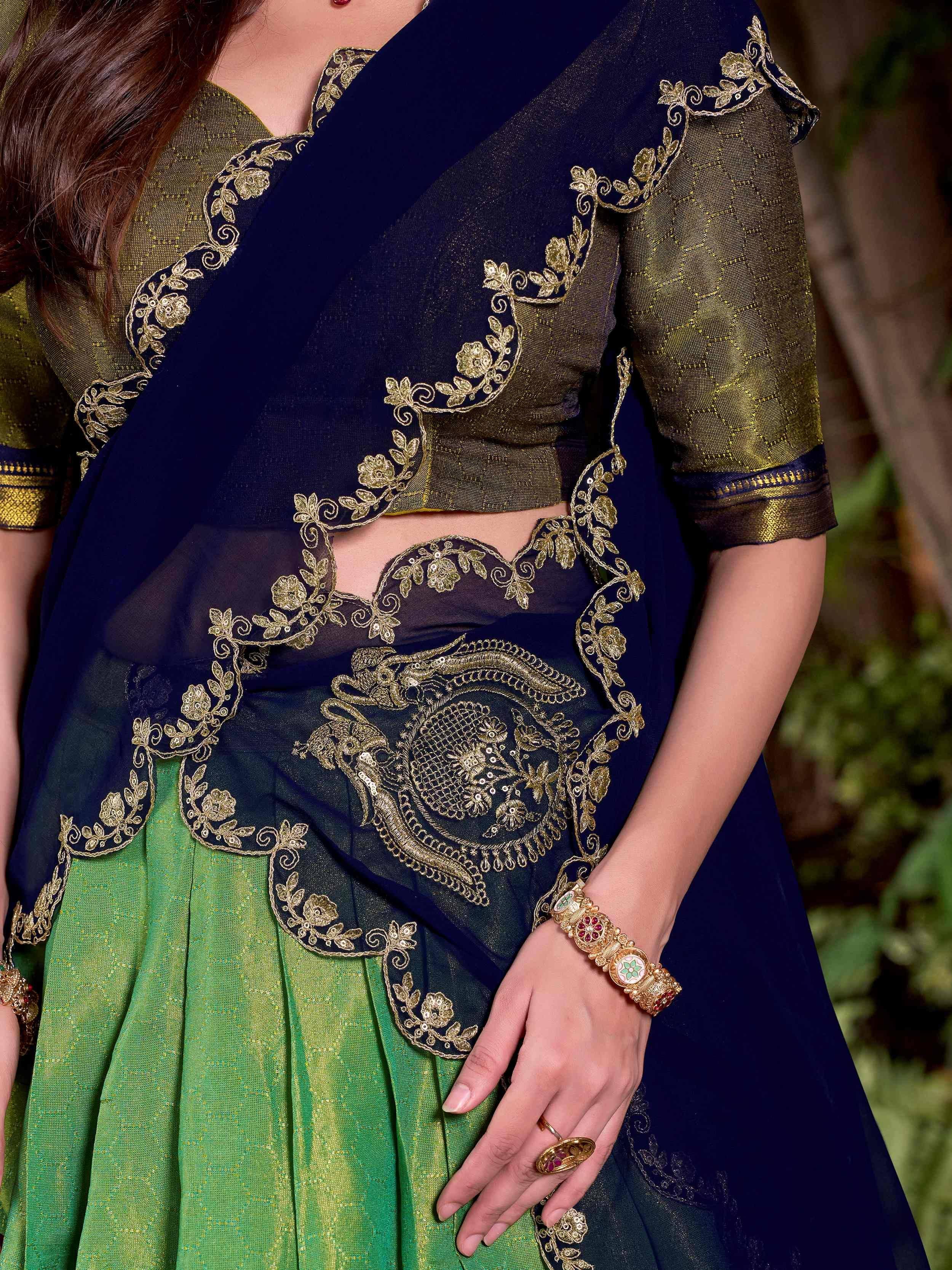 Elegant navy and green lehenga choli with gold embroidery, perfect for Indian ethnic wear occasions.