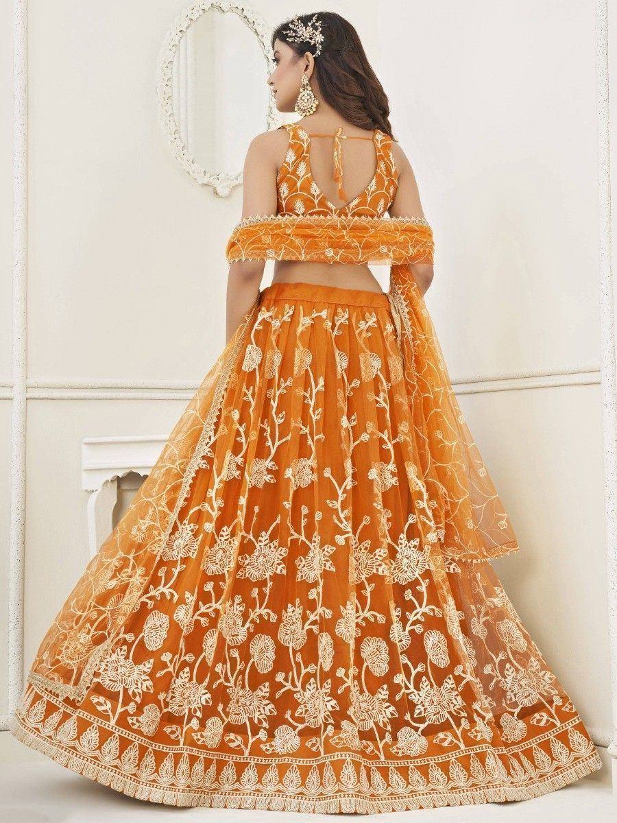 Orange floral embroidered lehenga choli with off-shoulder dupatta, perfect for Indian ethnic occasions