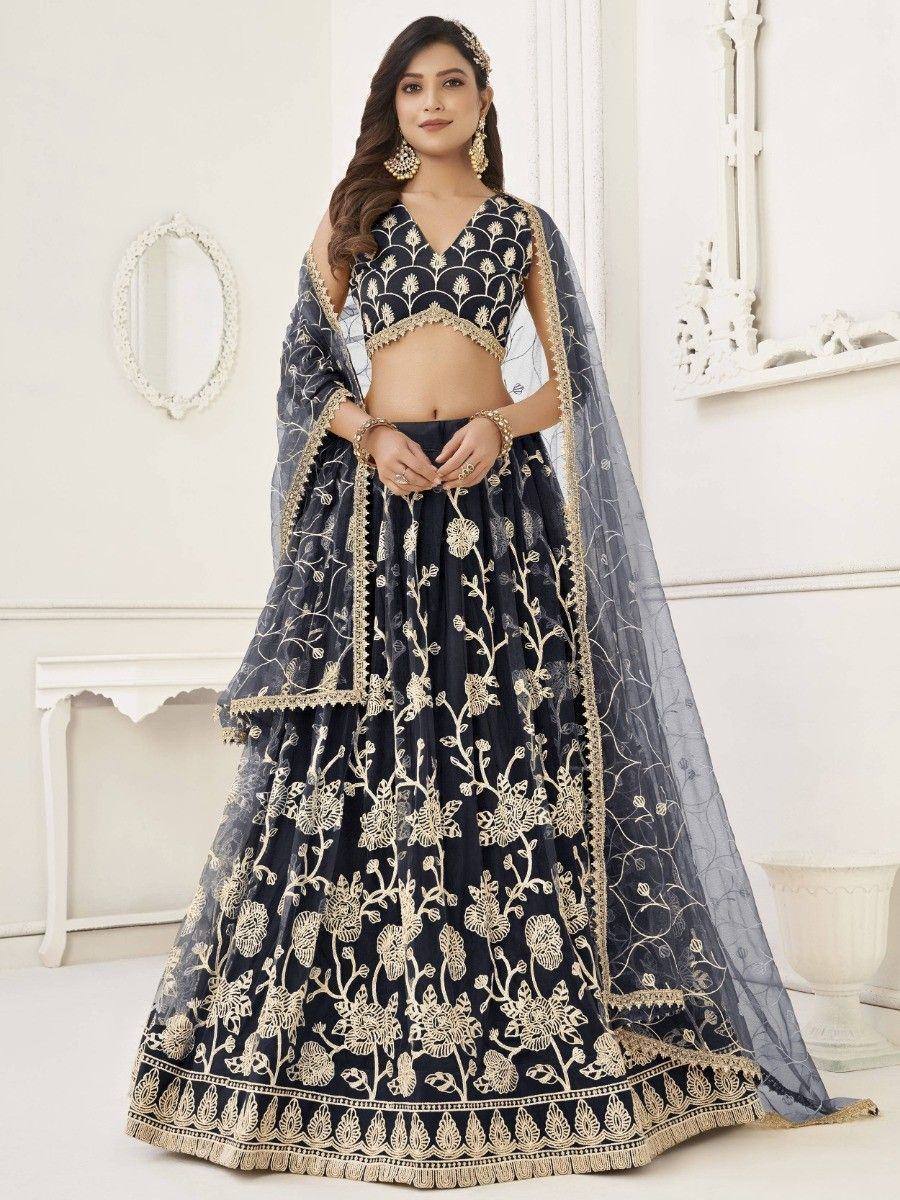 Navy blue designer lehenga choli with gold floral embroidery and sheer dupatta, perfect for Indian weddings