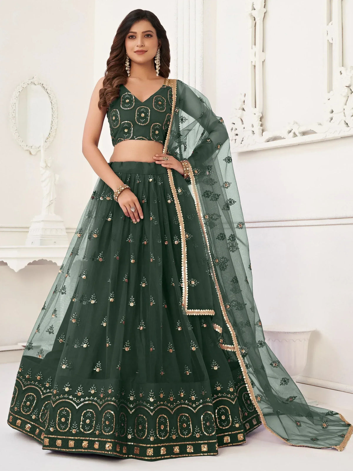 Emerald green embroidered lehenga choli with sheer dupatta, Indian ethnic wear for weddings and parties
