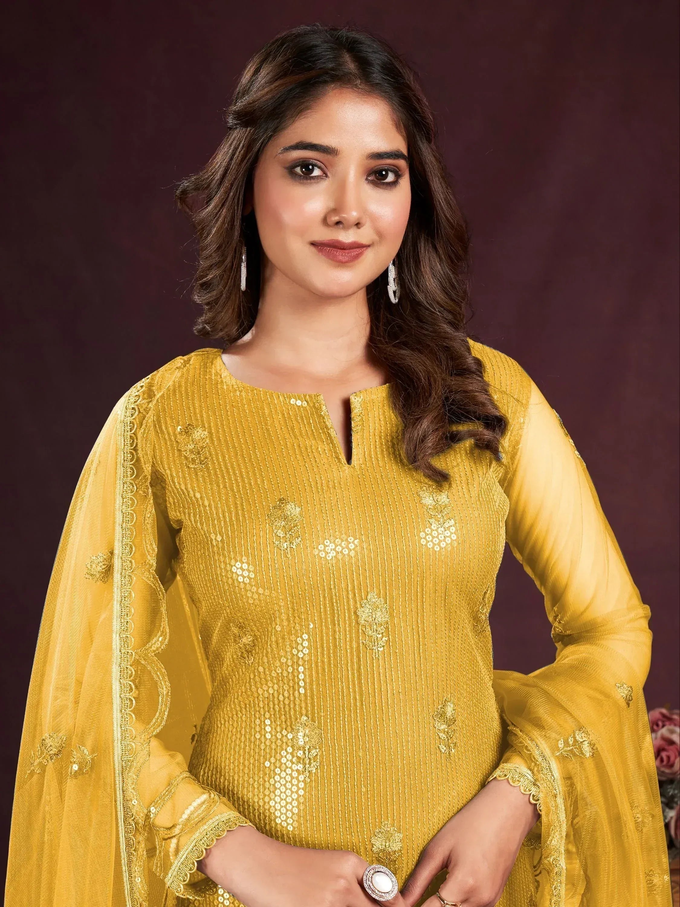 Yellow embroidered ethnic salwar kameez with sequin detailing and sheer sleeves