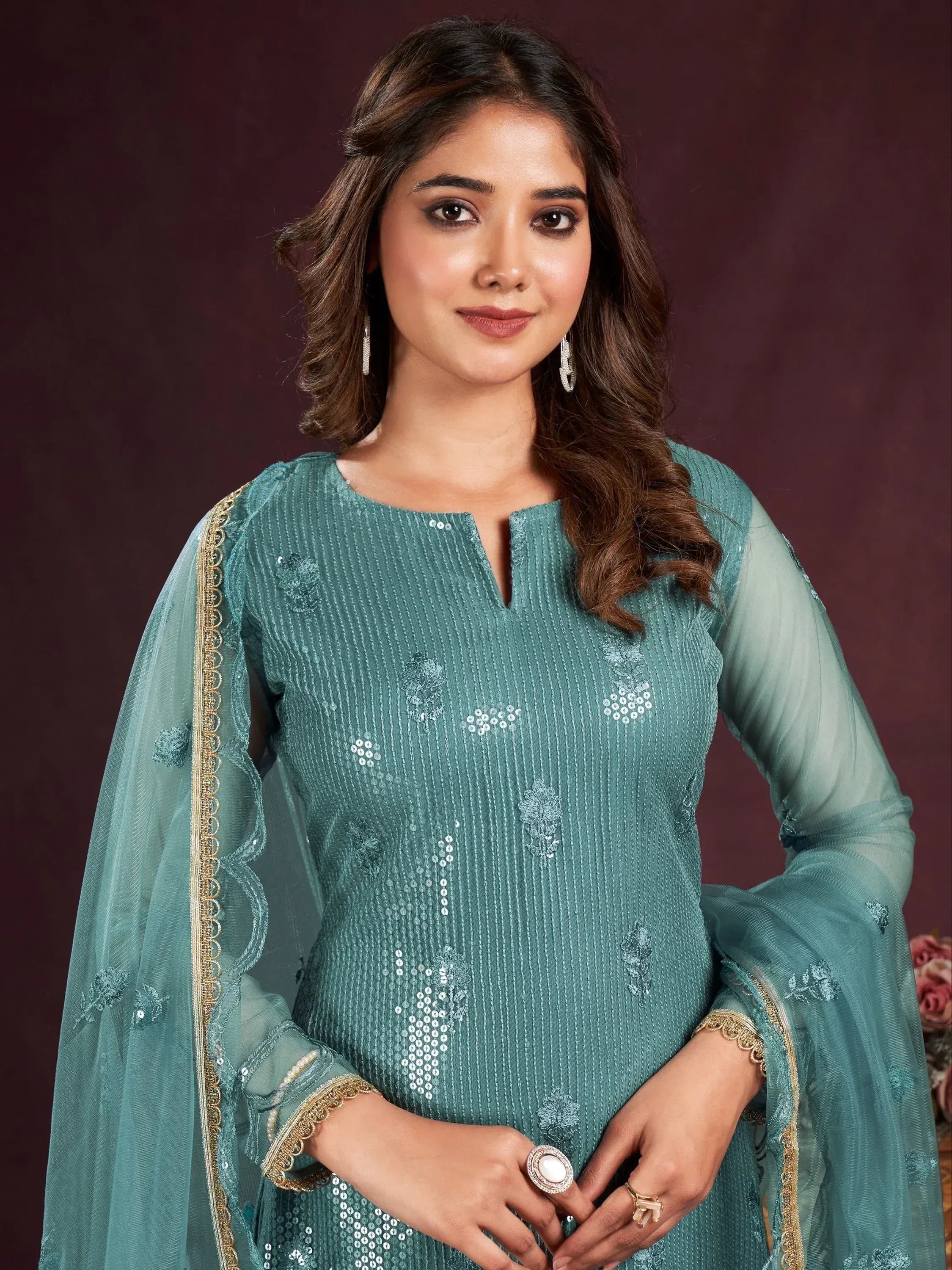 Teal ethnic salwar kameez with sequin embroidery and sheer sleeves
