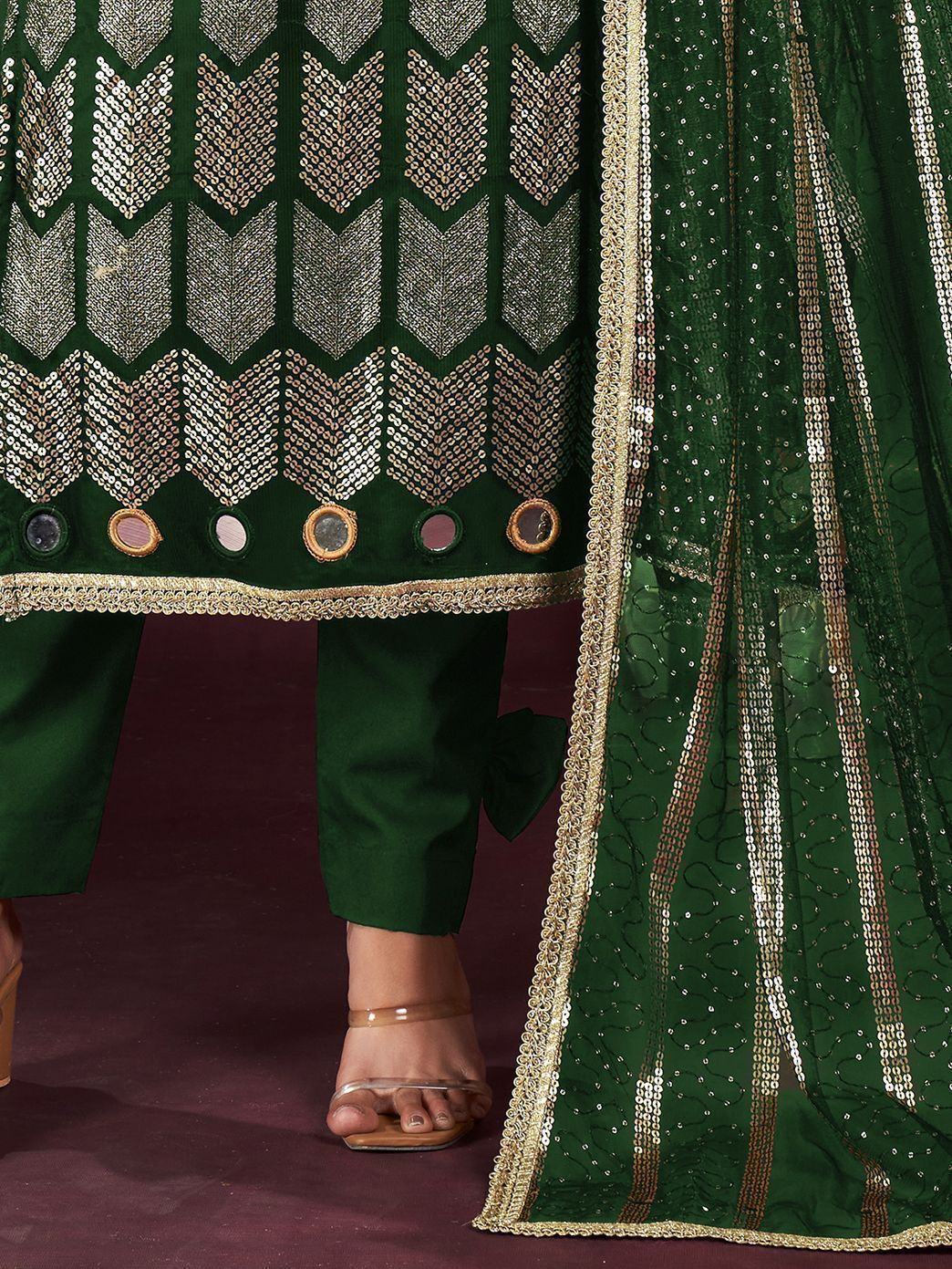 Green ethnic suit with sequin embroidery, gold border, and matching dupatta