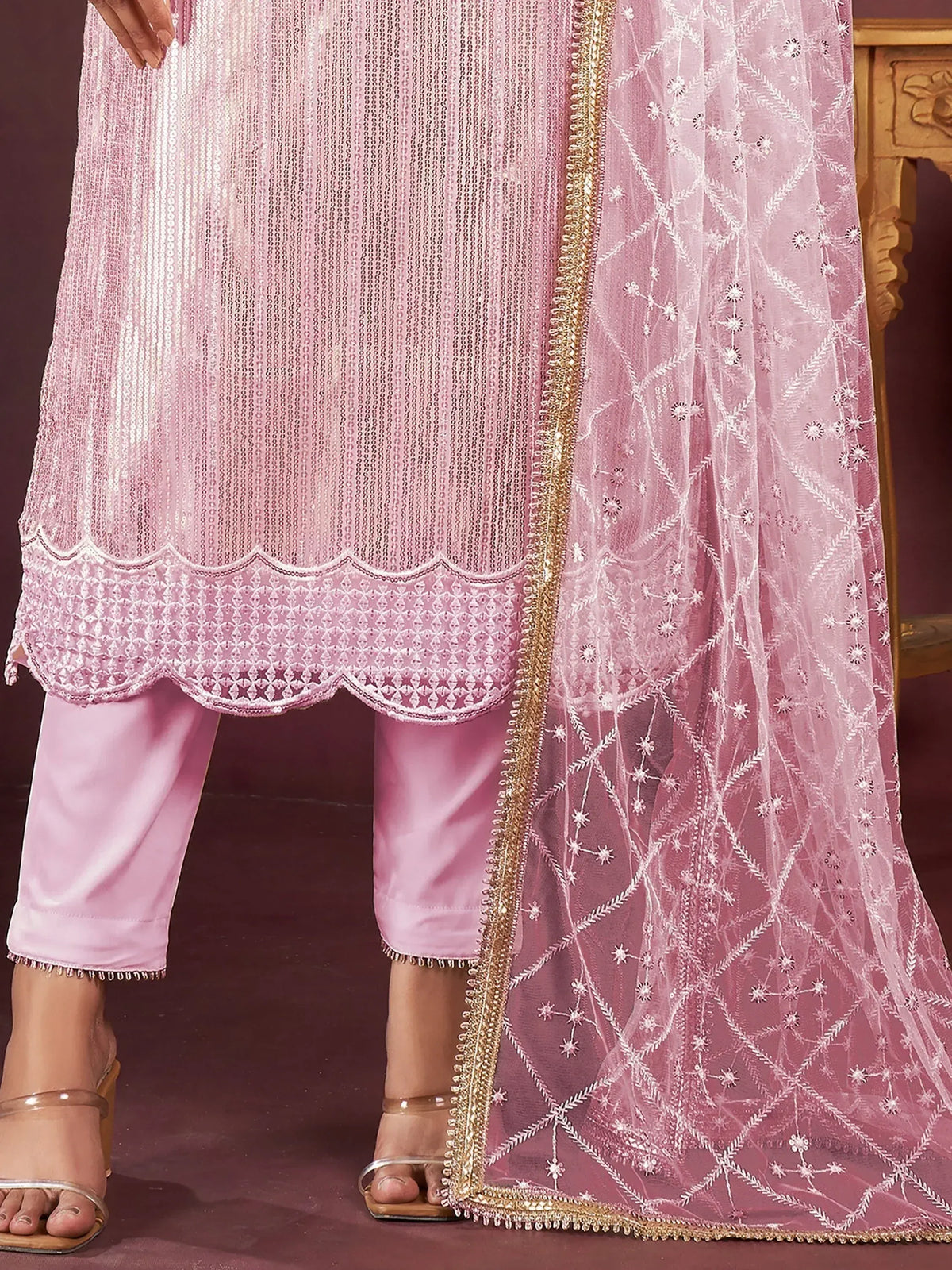 Pink embroidered salwar kameez with sequin top, scalloped hem, and sheer dupatta for ethnic wear