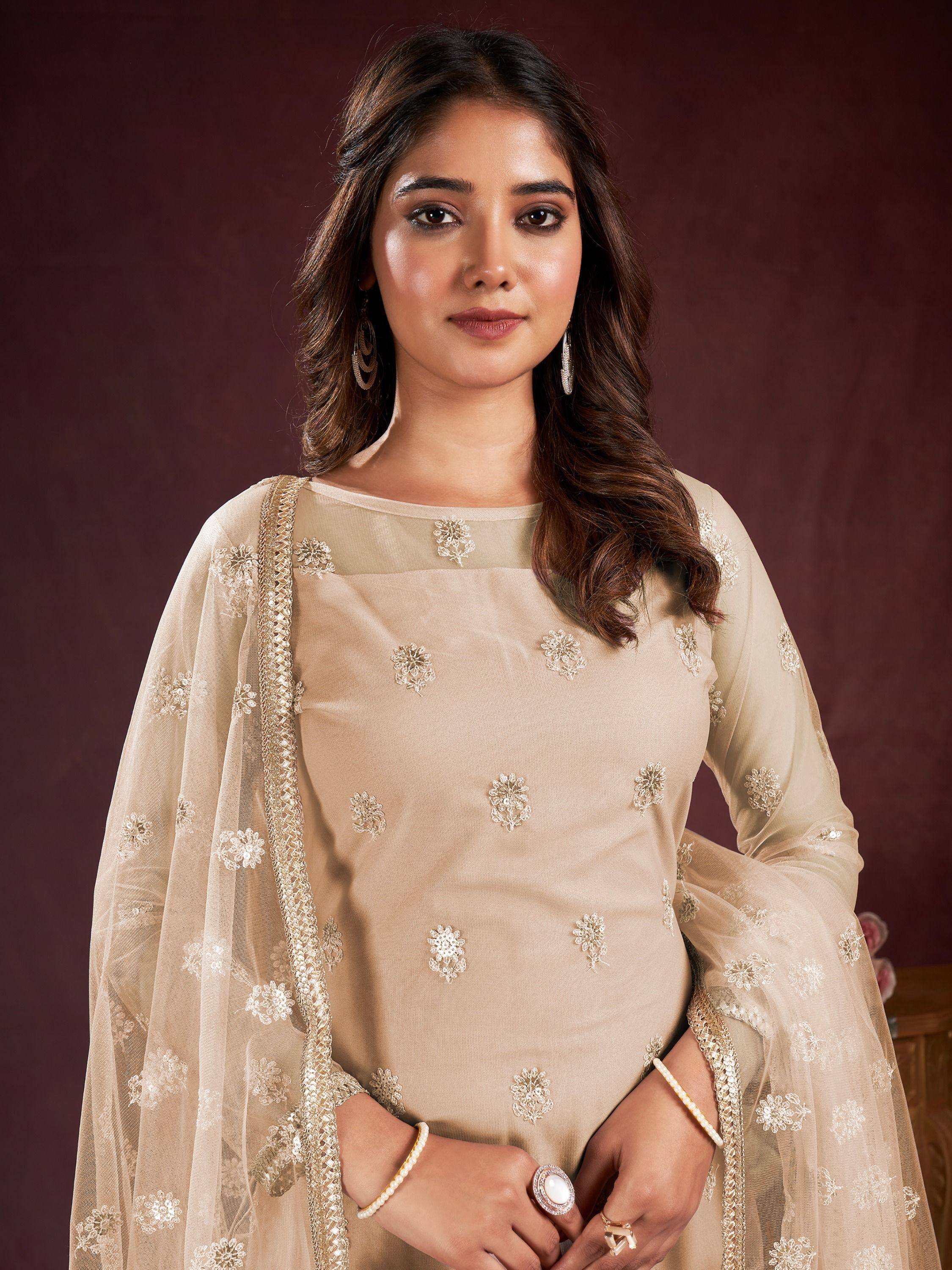 Beige embroidered ethnic salwar kameez with sheer dupatta, perfect for Indian occasions and festive wear.