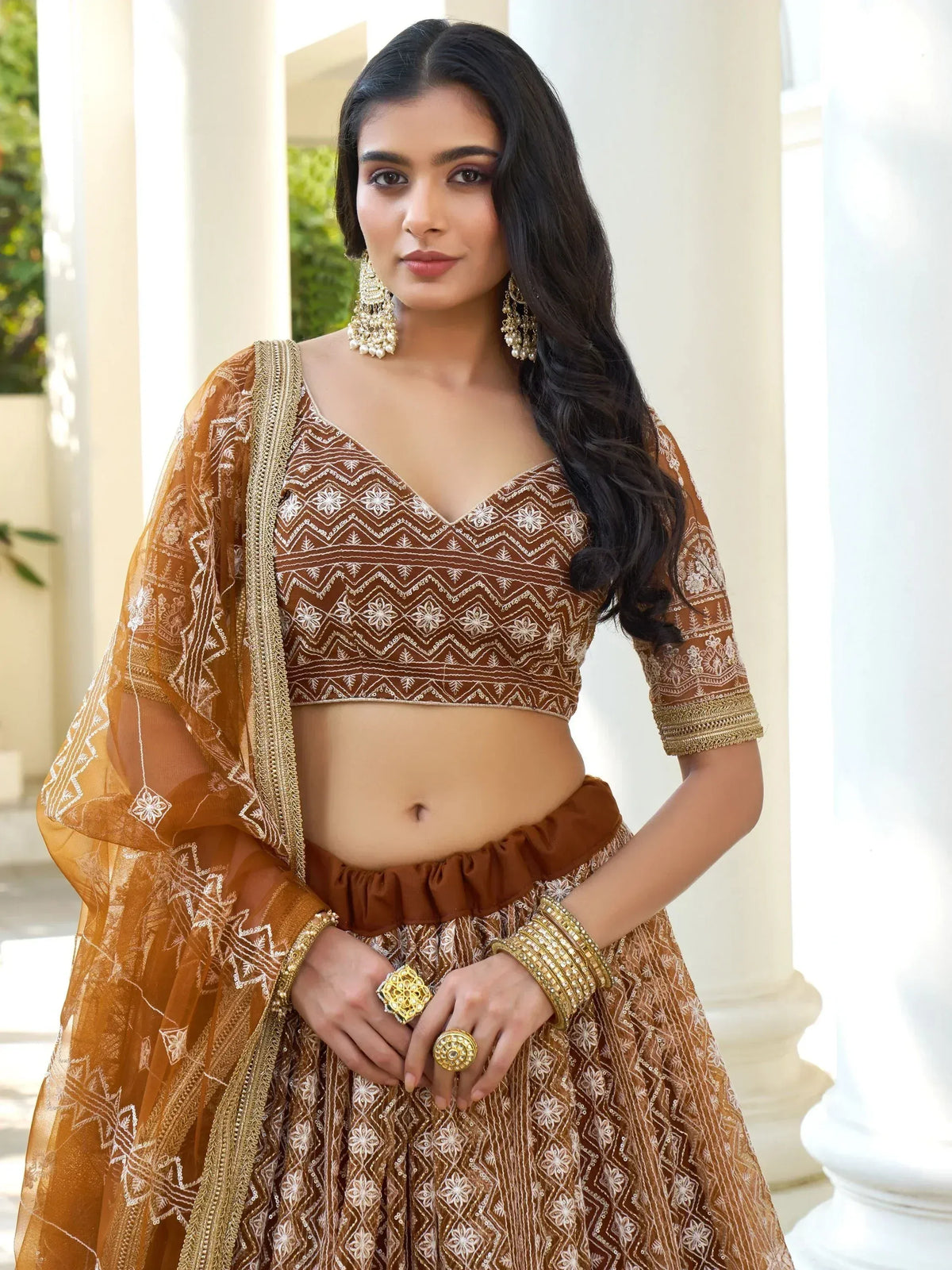 Brown embroidered lehenga choli with dupatta, perfect for Indian ethnic wear and festive occasions.