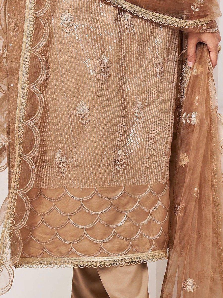 Elegant gold embroidered salwar kameez with sequin detailing and scalloped hem, perfect for ethnic occasions.