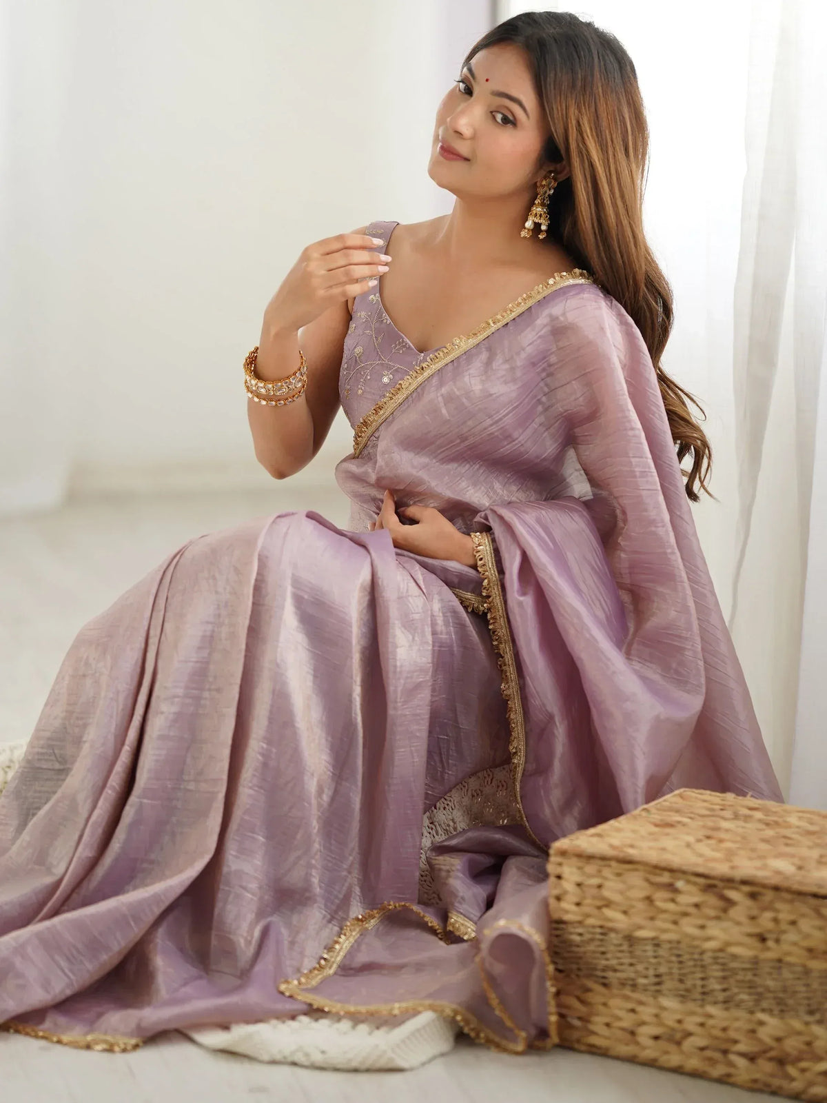 Lavender designer saree with gold embroidery, perfect for Indian ethnic wear occasions
