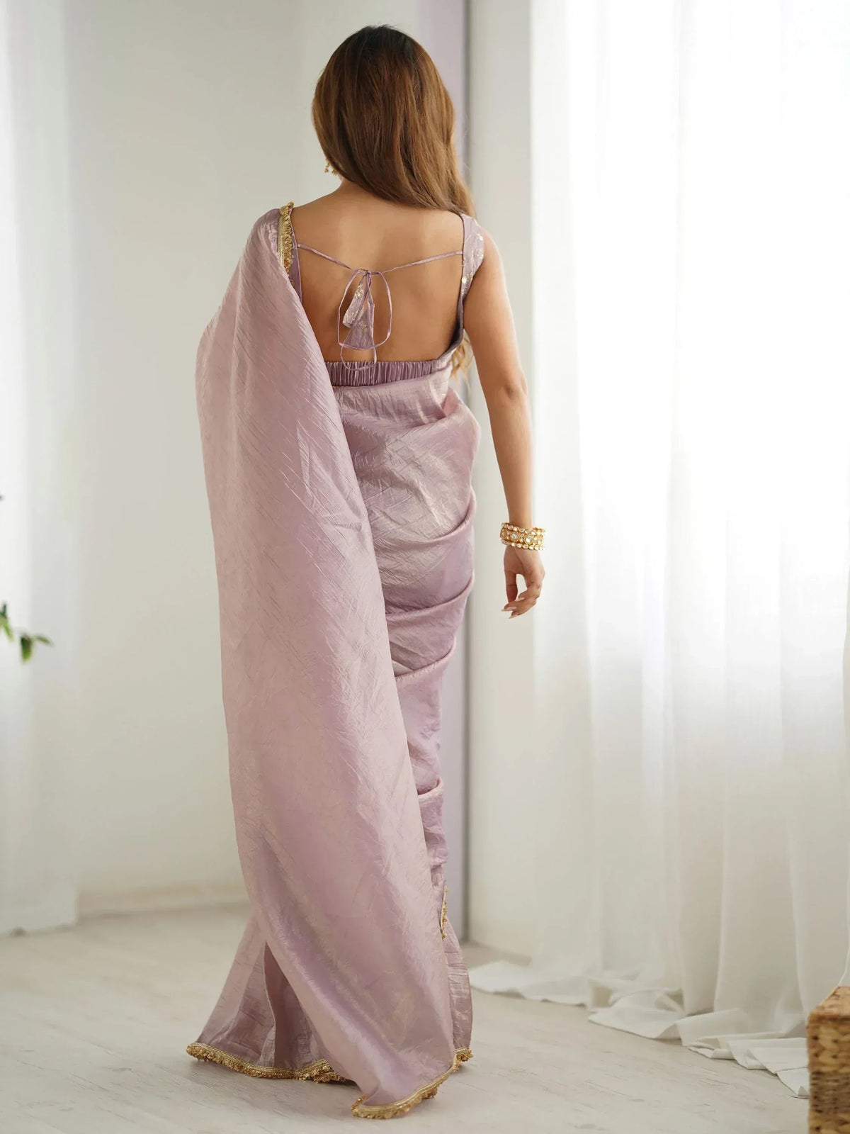 Lavender saree with gold trim and back tie blouse, elegant Indian ethnic wear