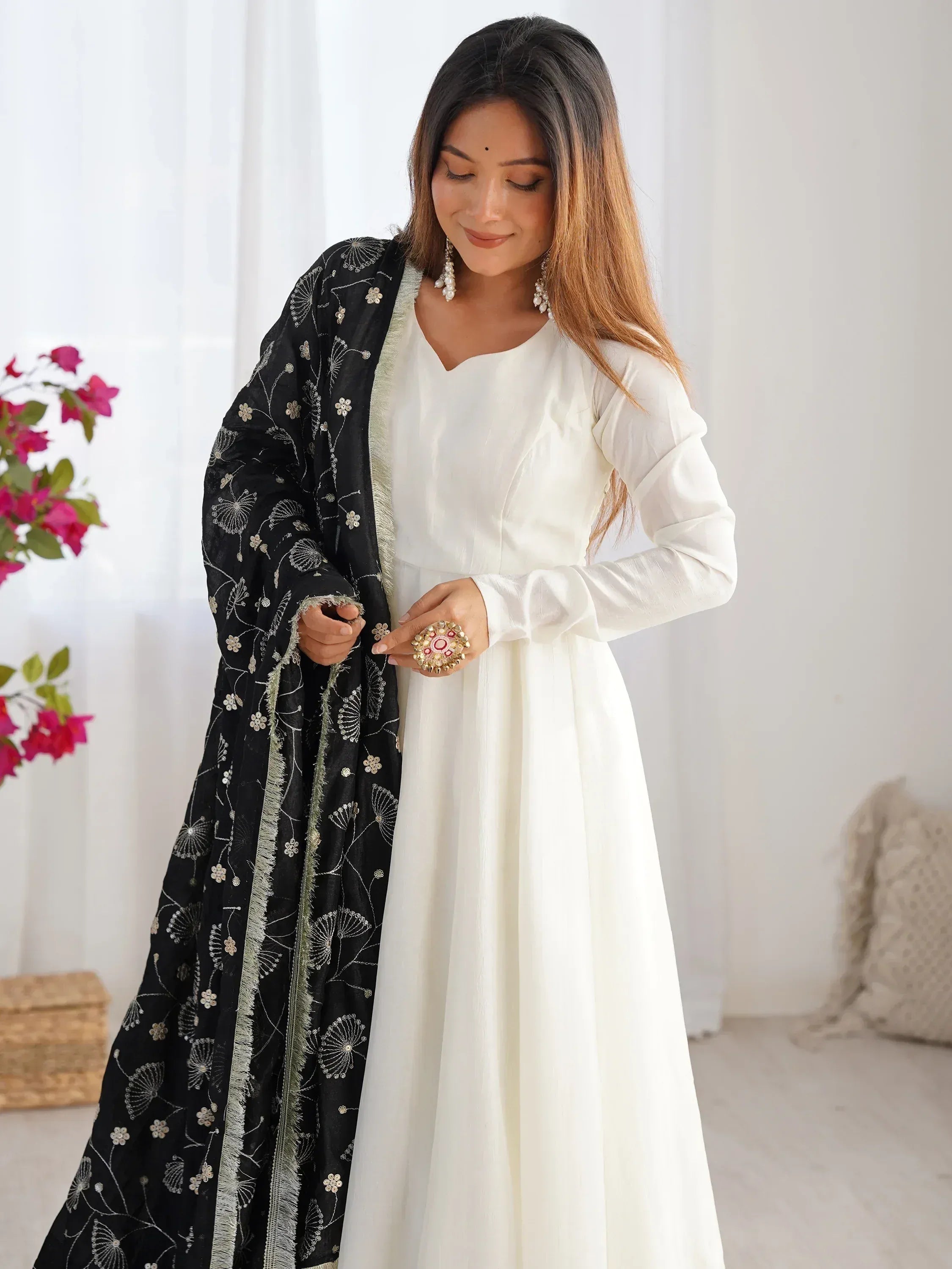 White ethnic gown with black embroidered dupatta, perfect for Indian occasions and festive wear