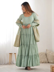 Woman in sage green ethnic gown with long sleeves and gold dupatta, Ethnic Plus fashion