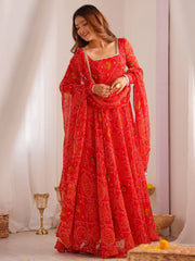 Woman in red bandhani lehenga choli with dupatta, Indian ethnic wear by Ethnic Plus