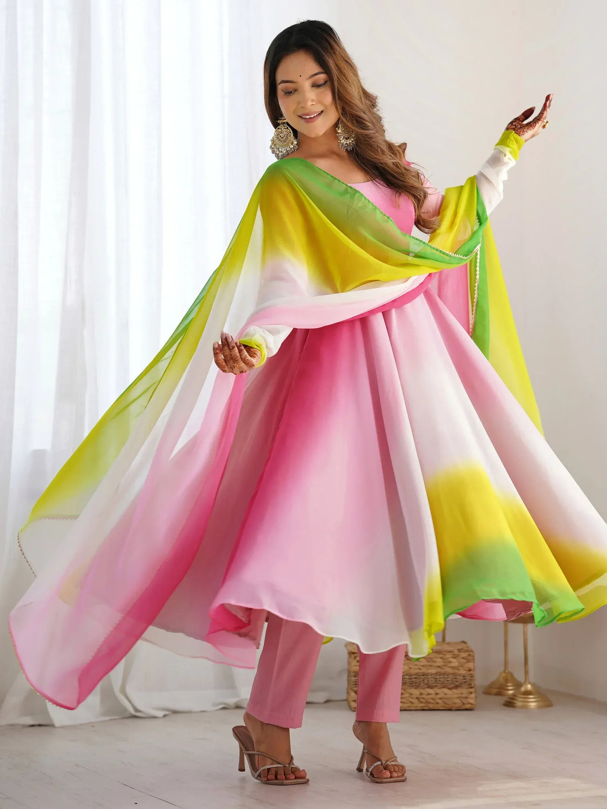 Pink and yellow ombre ethnic gown with matching dupatta, perfect for festive occasions and Indian celebrations