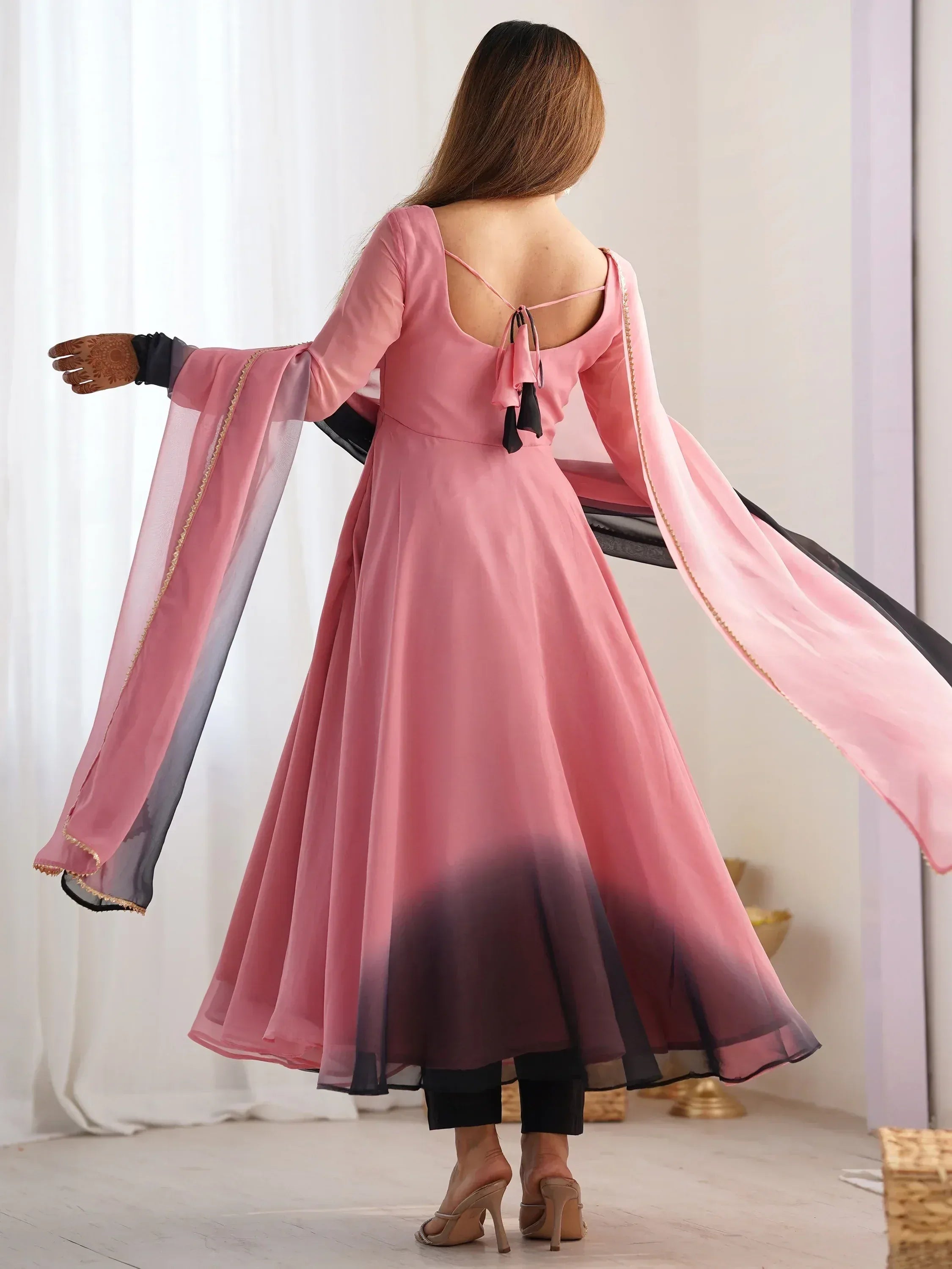 Pink ombre ethnic gown with sheer sleeves and back tie detail