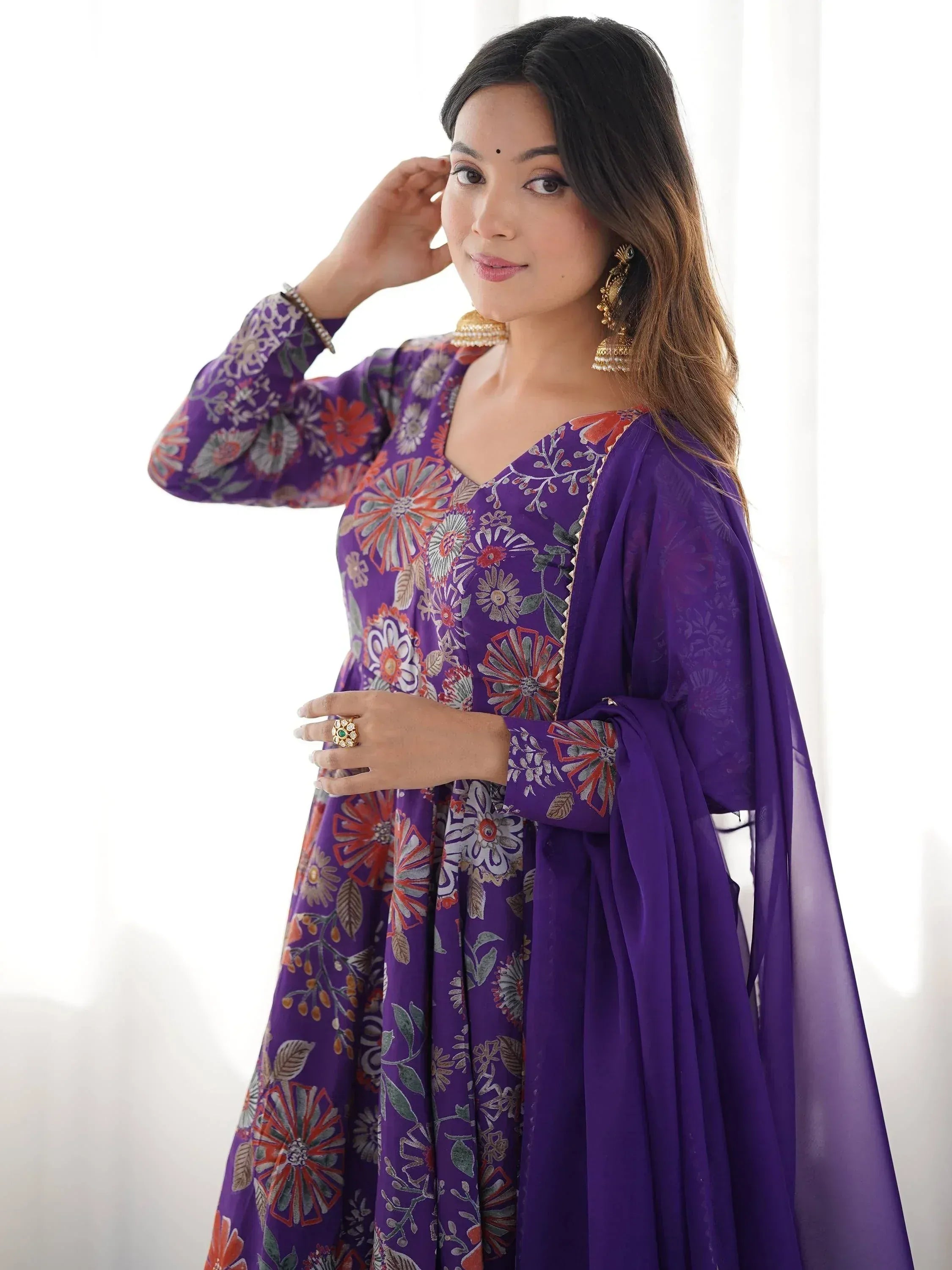 Purple floral printed Indian ethnic gown with dupatta, perfect for festive occasions and weddings.