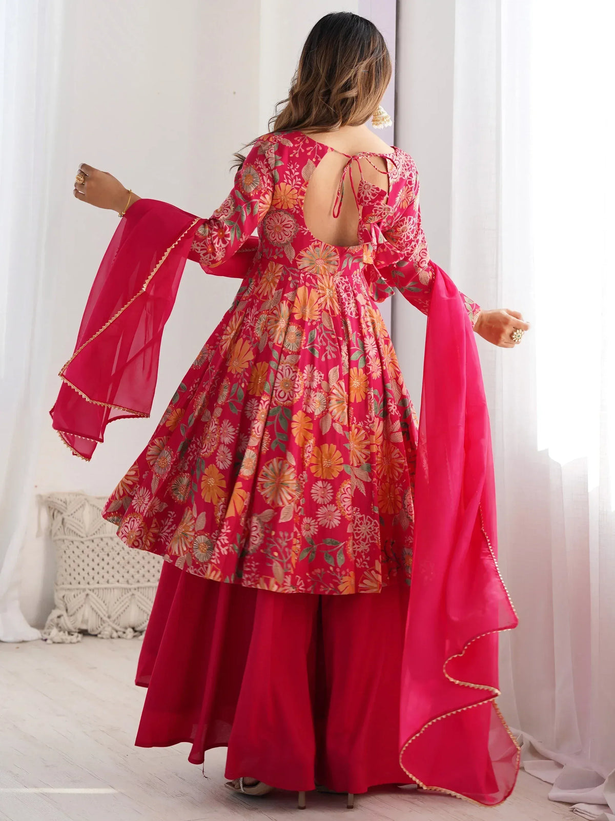 Pink floral printed ethnic anarkali with flared sleeves and back tie detail