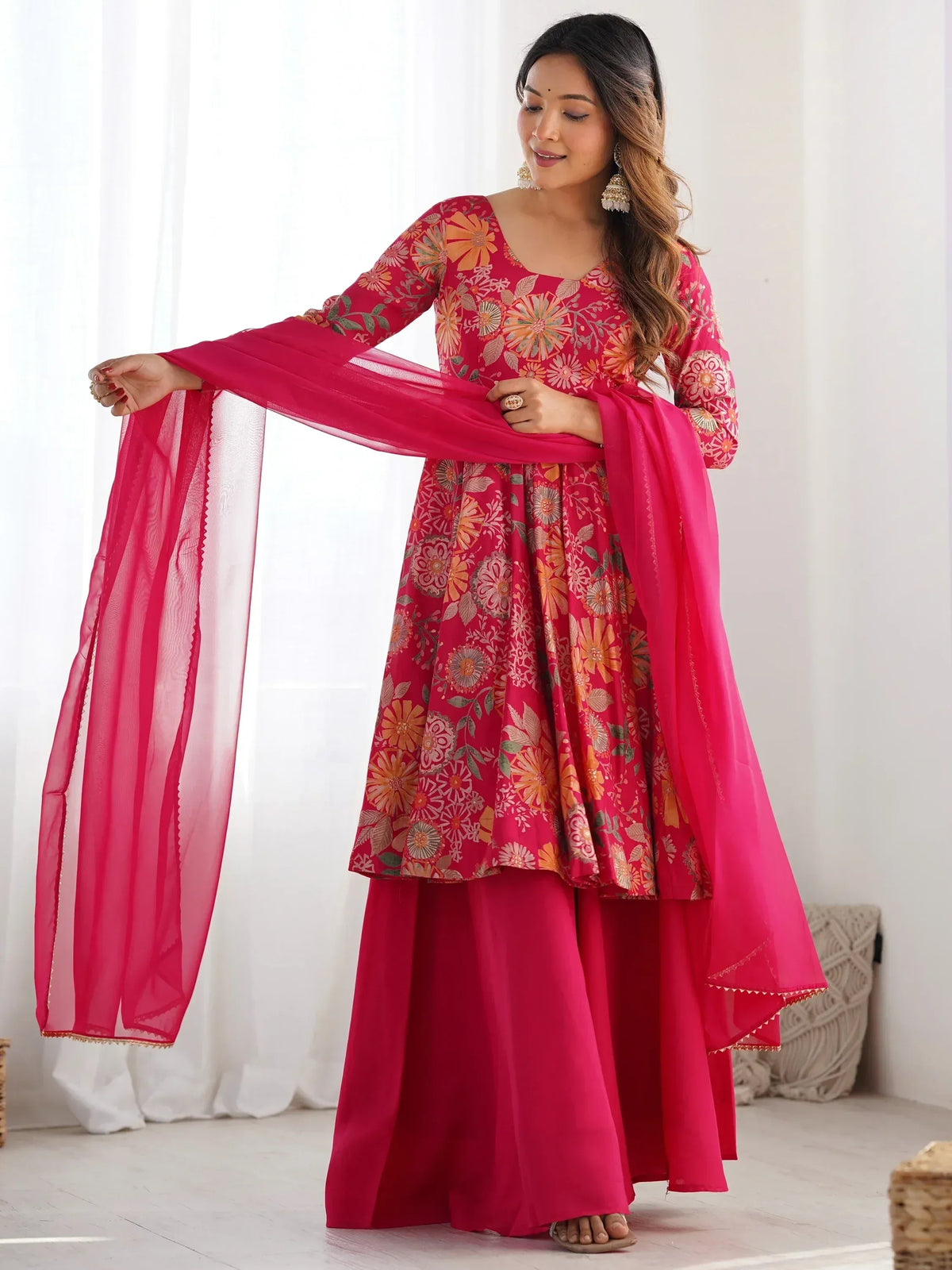 Vibrant pink floral anarkali suit with matching dupatta, perfect for Indian ethnic wear occasions