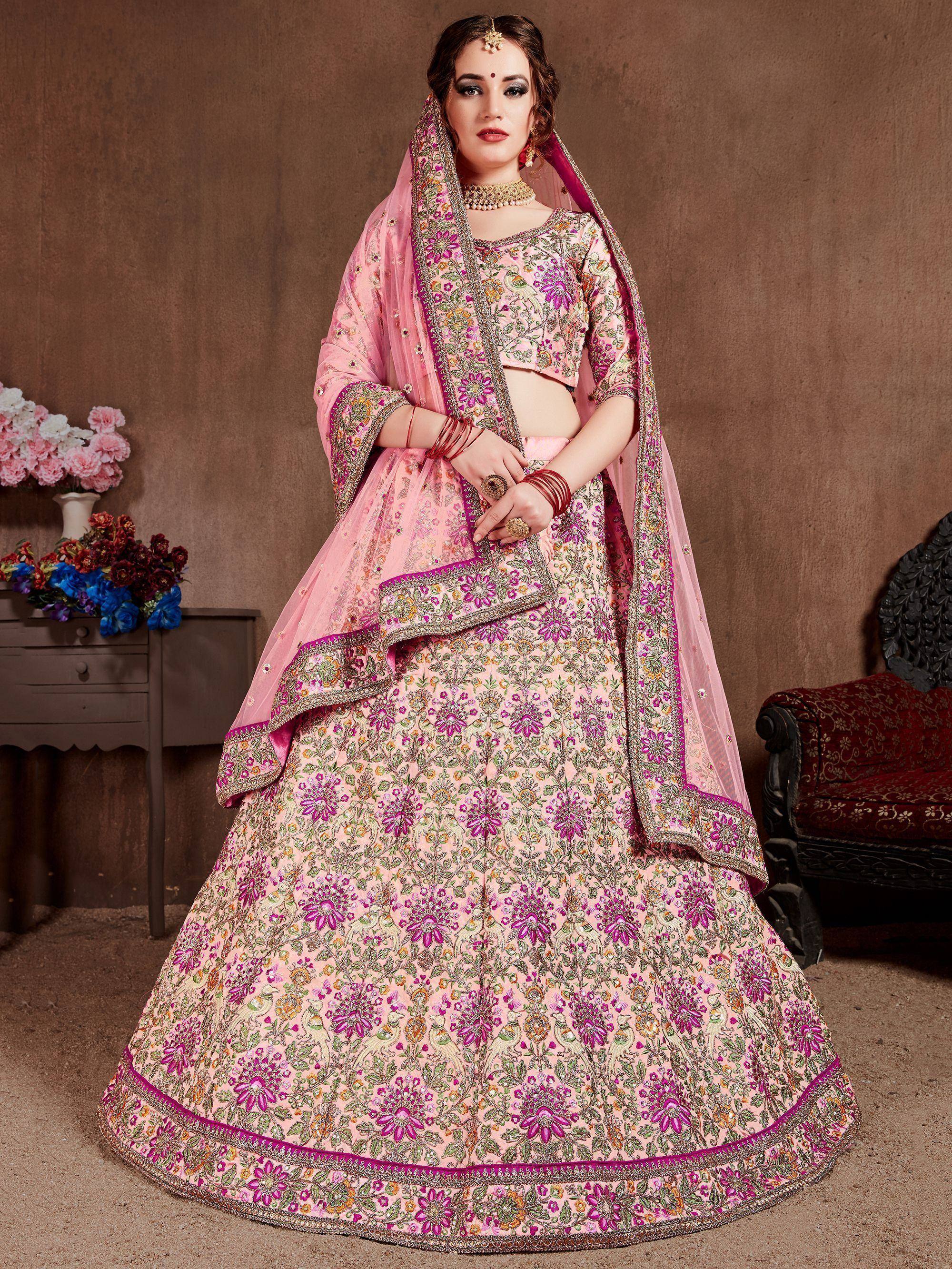 Pink floral embroidered lehenga choli with matching dupatta, perfect for Indian weddings and festive occasions.